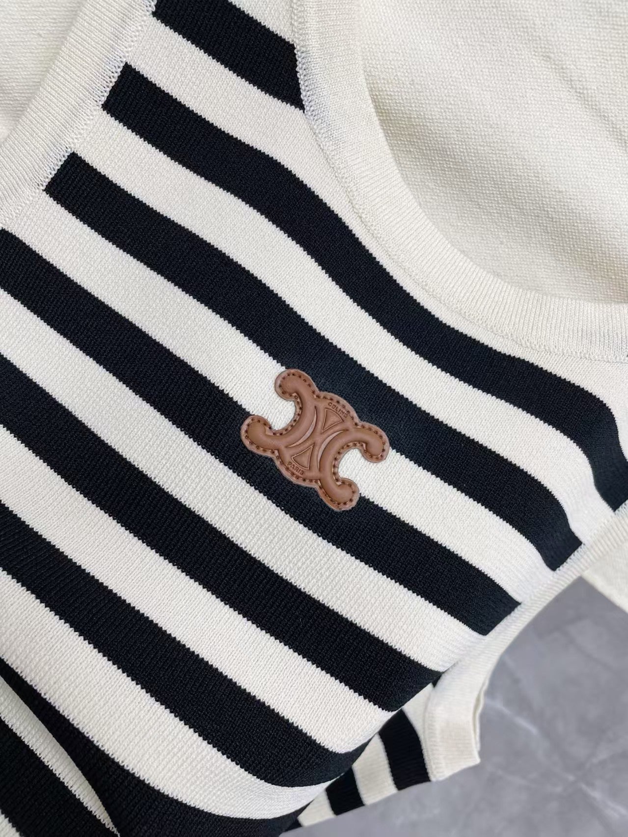 New contrast striped vest