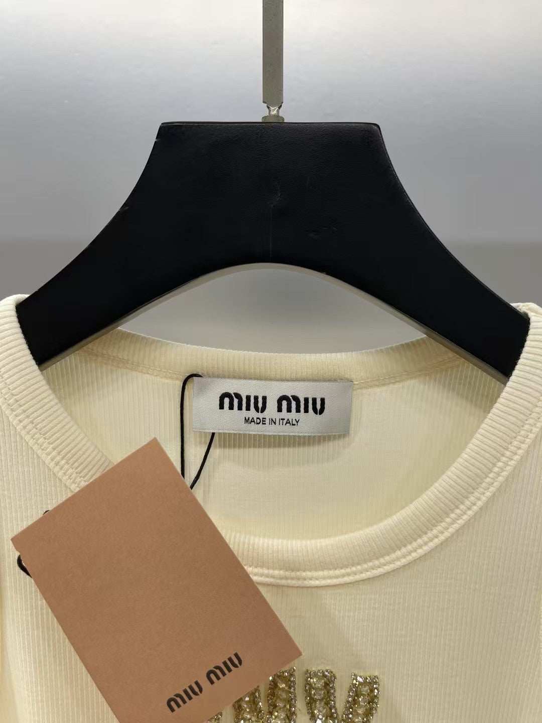 Yellow rhinestone lettering vest