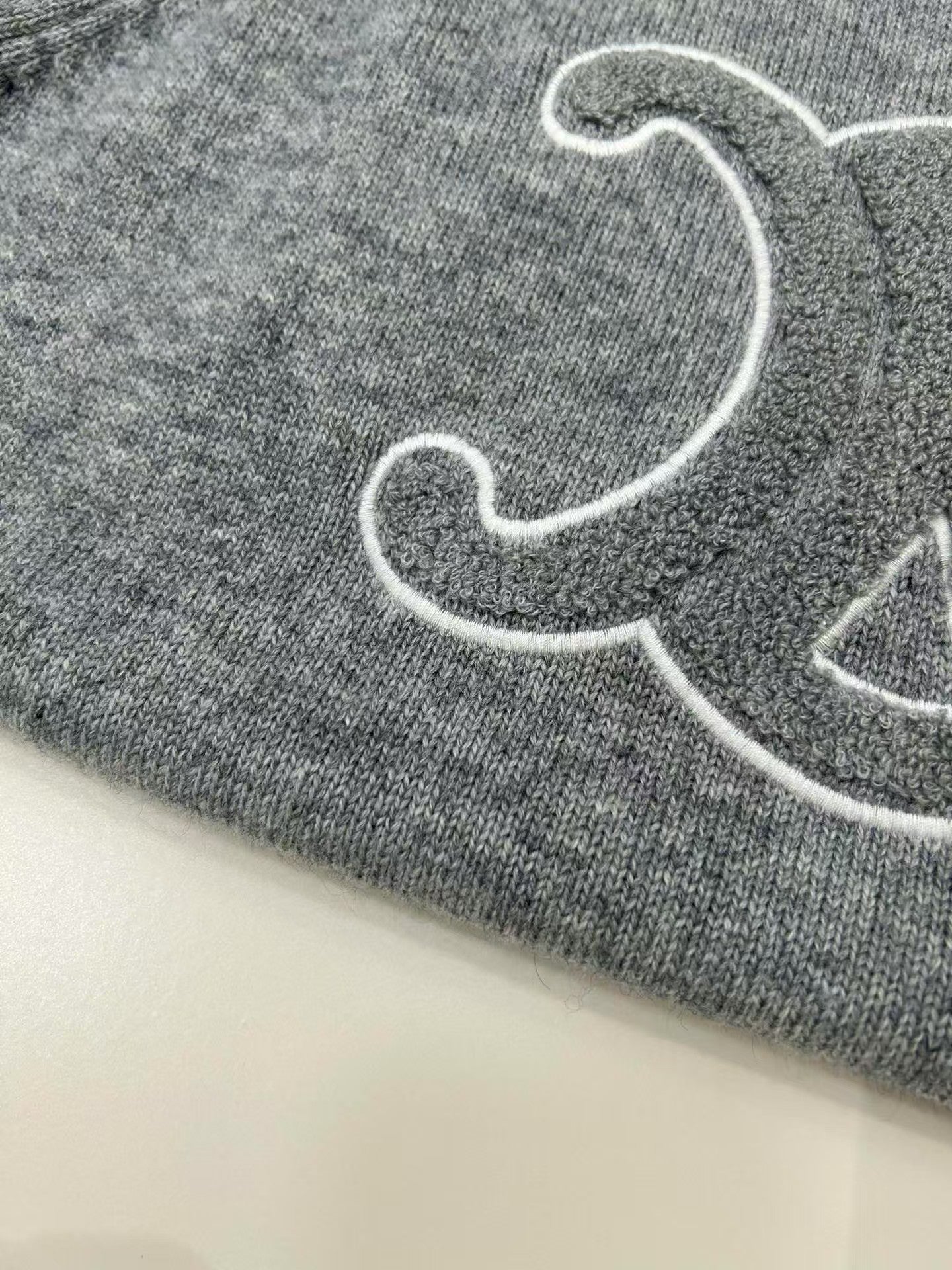 Terry-embroidered Arc de Triomphe hooded wool sweater