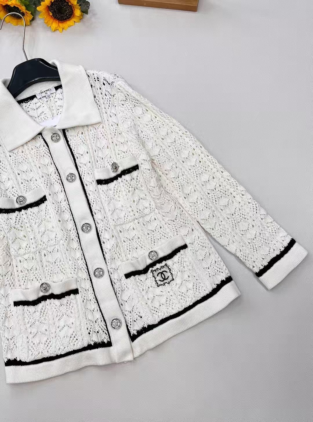 26SS openwork pocket embroidered logo knit sweater