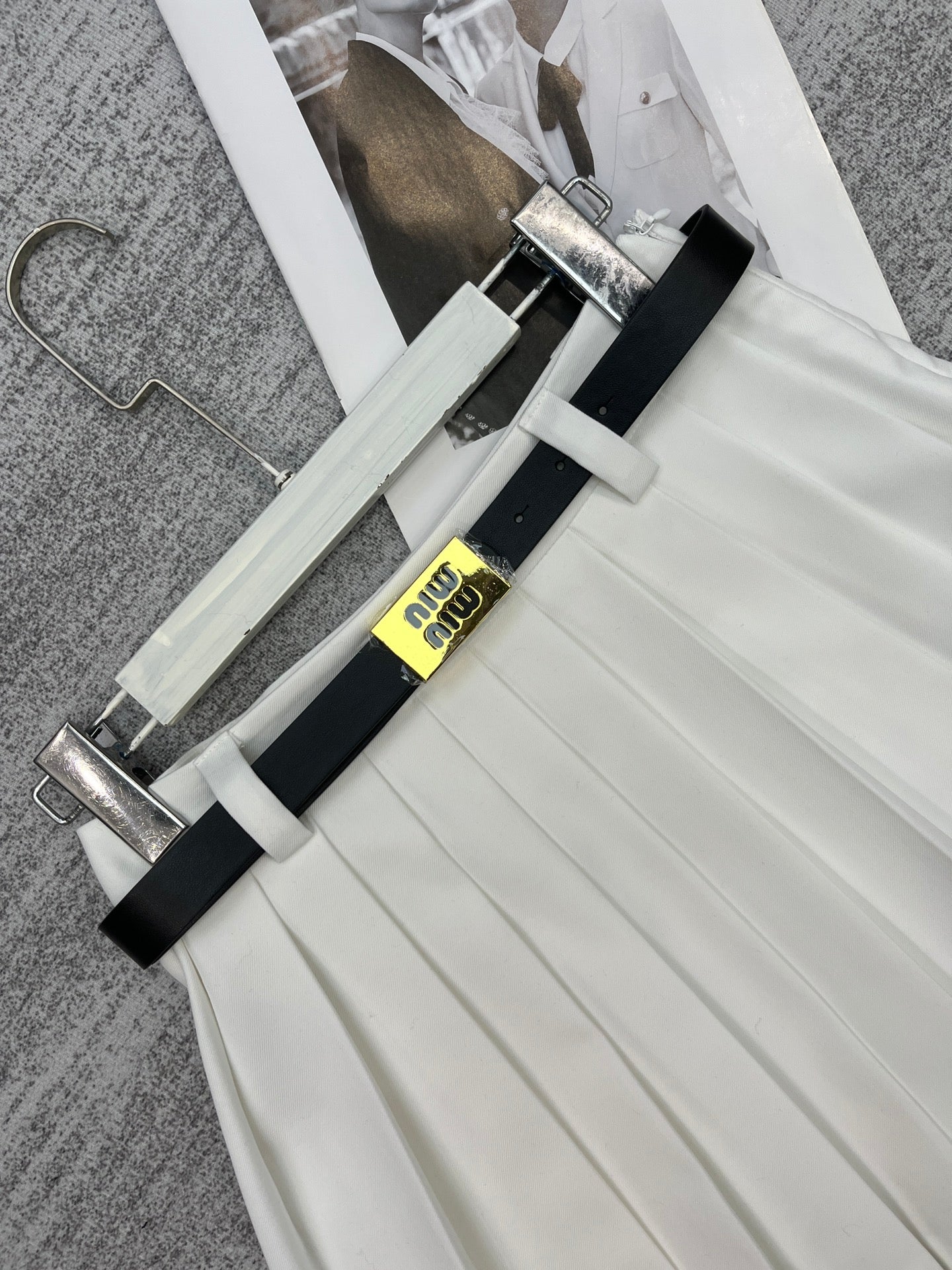 New style pleated skirt with belt.
