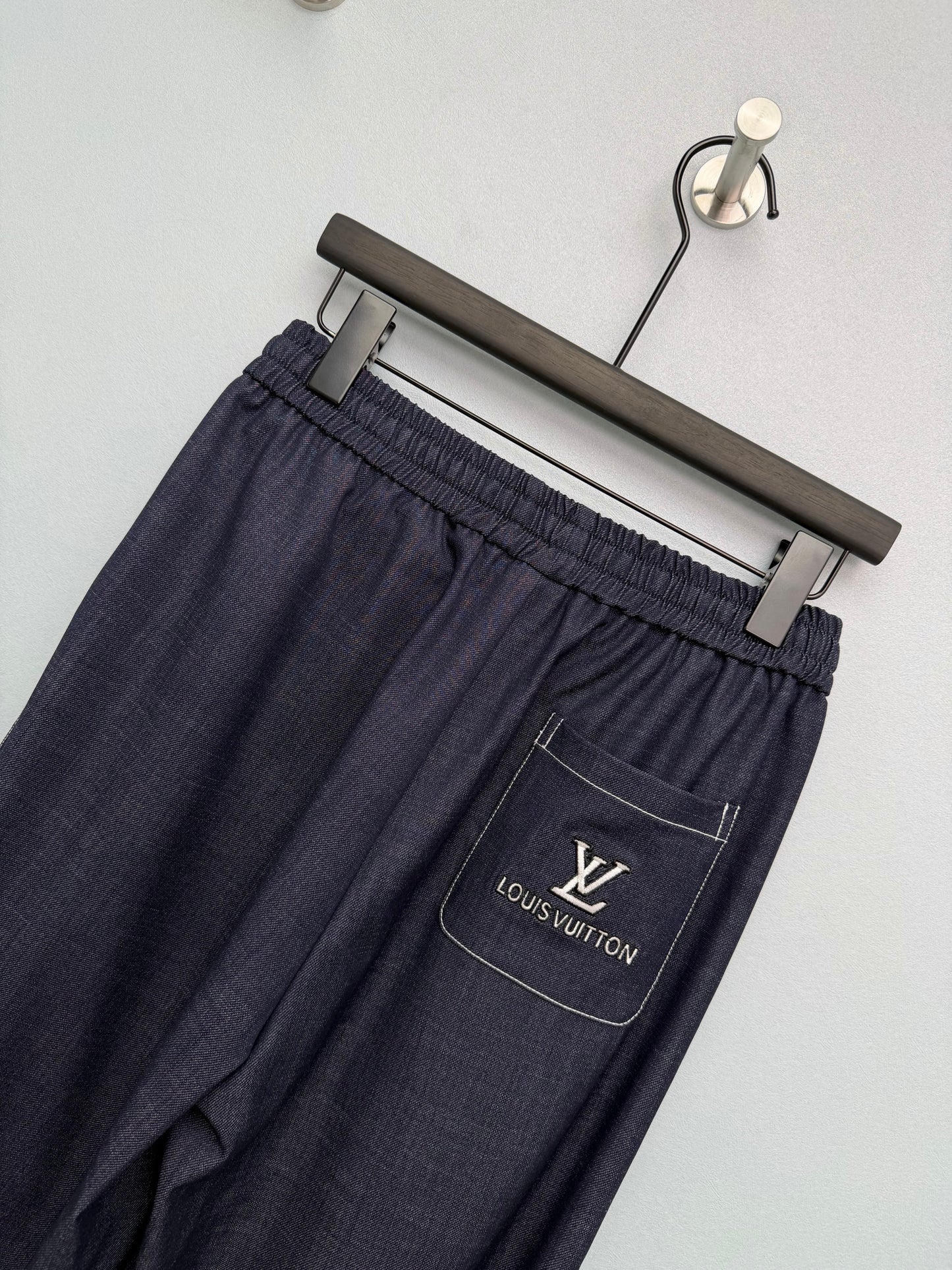 26. Wide-Leg Trousers with Side Drawstrings and Exposed Stitching