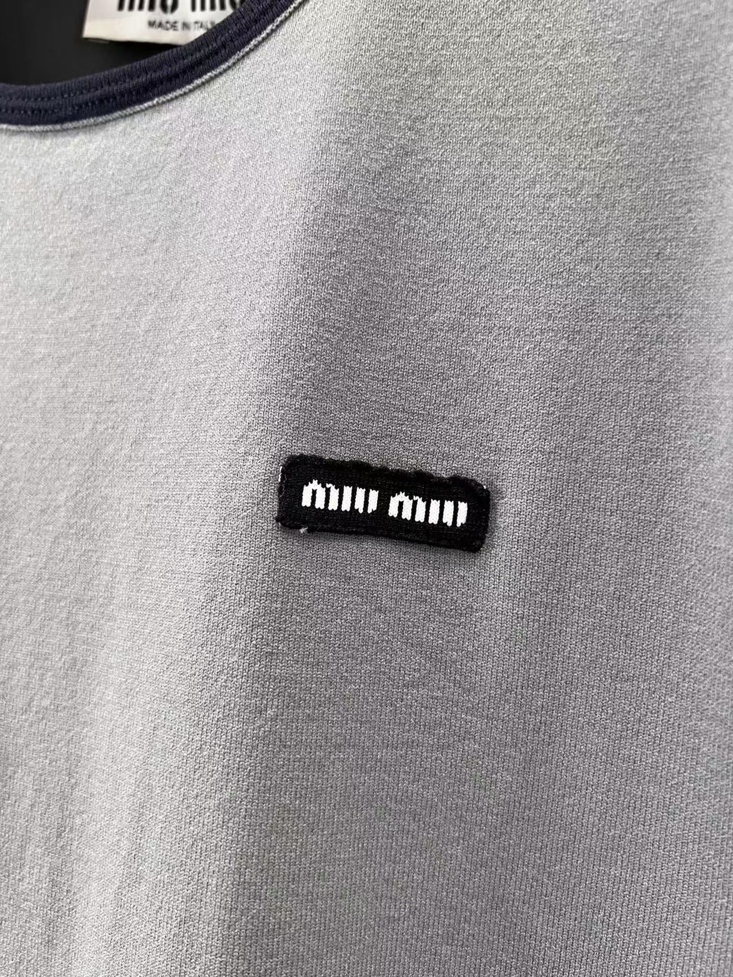 Contrast color knitted crew neck short sleeve top