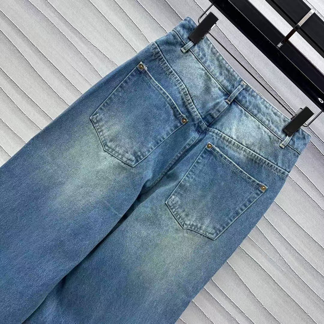 Leather brand denim trousers