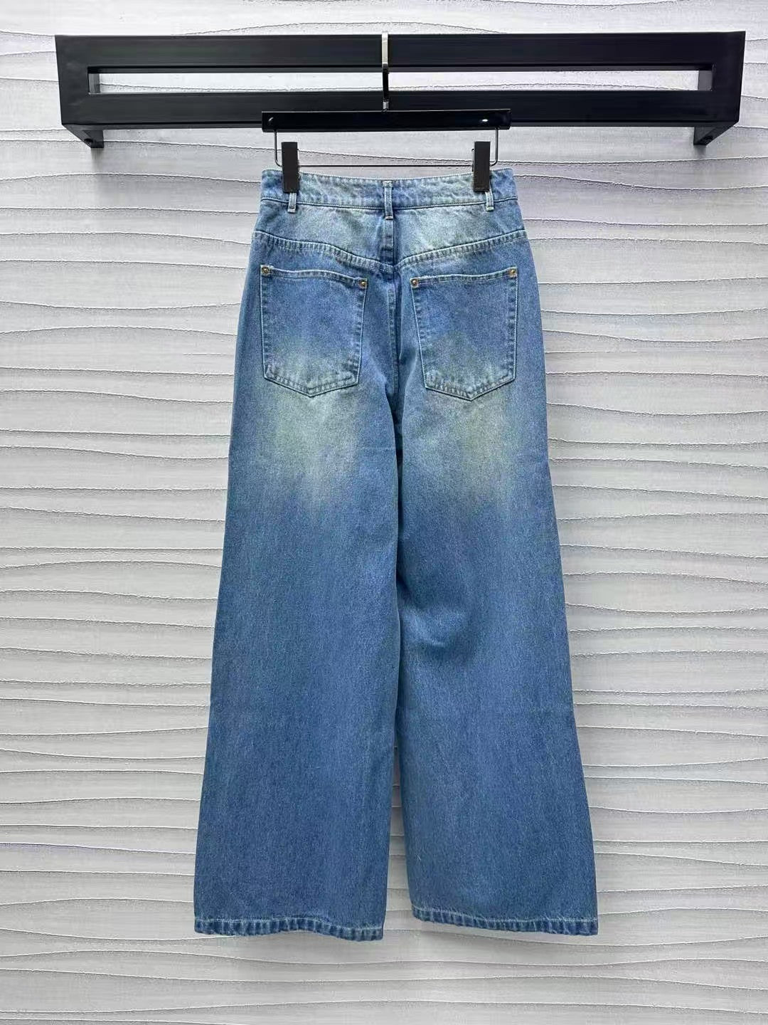 Leather brand denim trousers