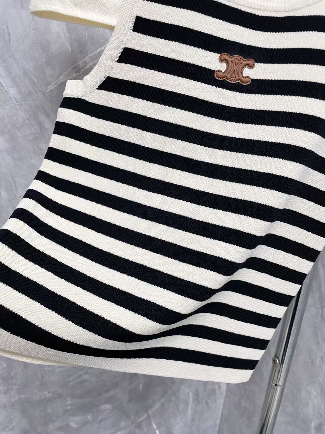 New contrast striped vest
