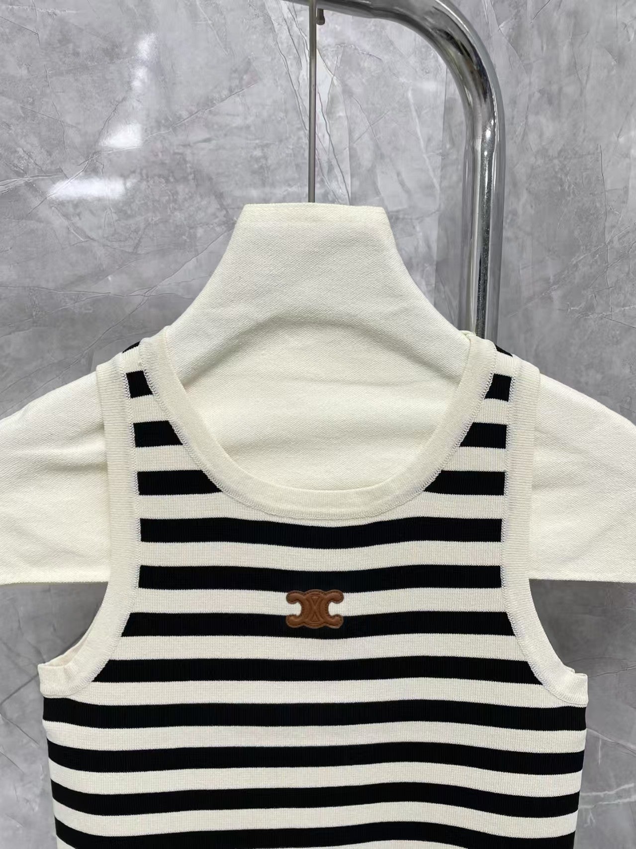 New contrast striped vest