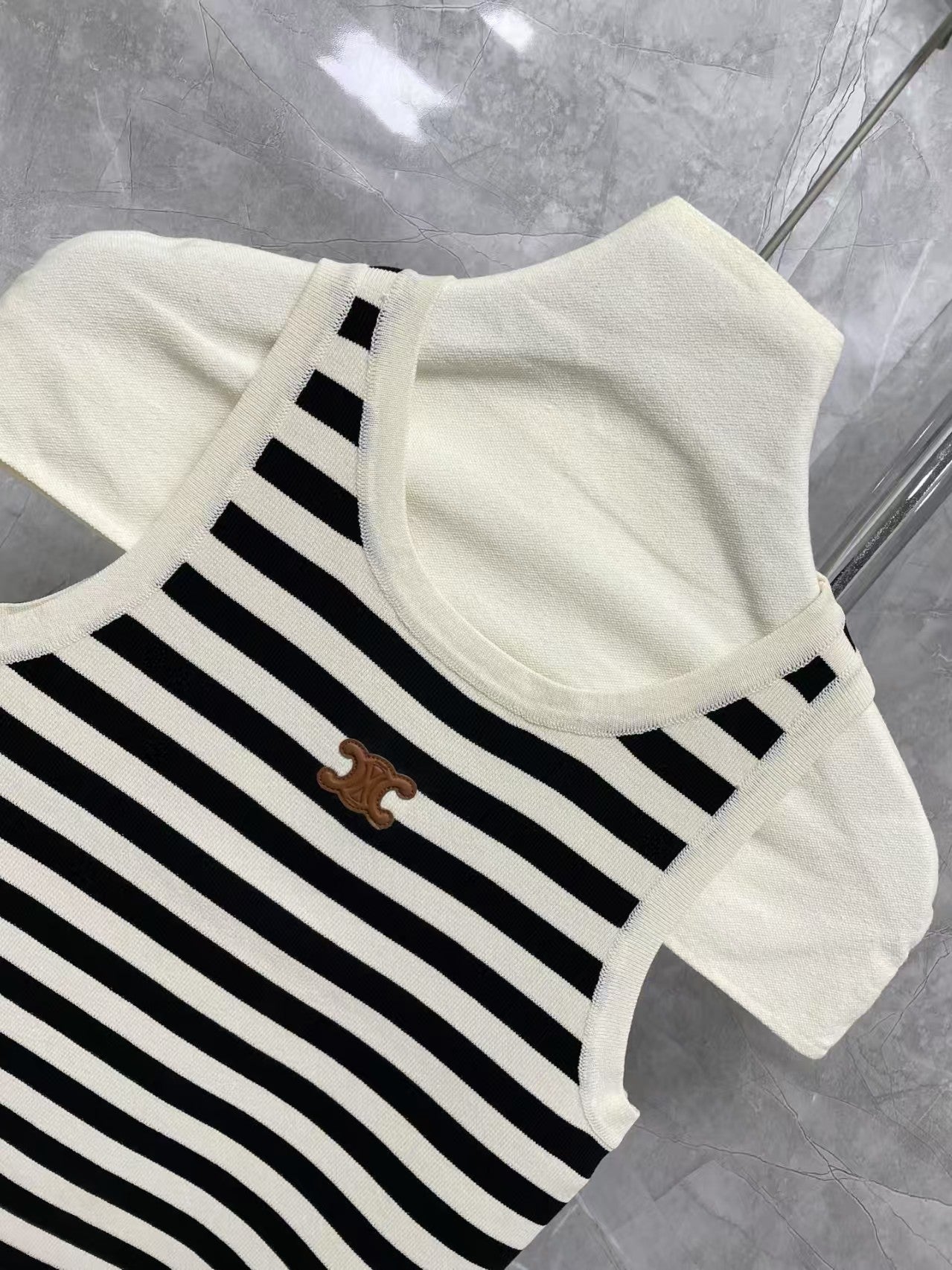 New contrast striped vest