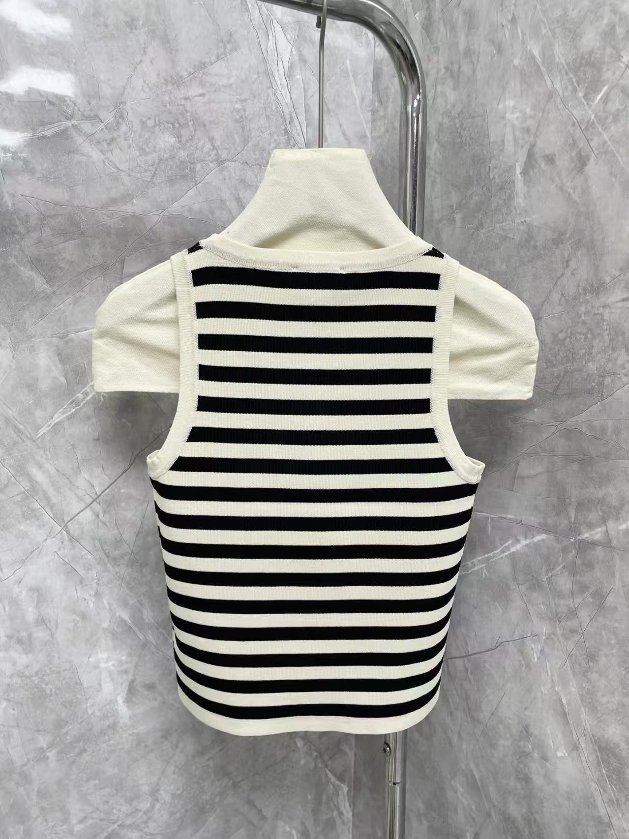 New contrast striped vest