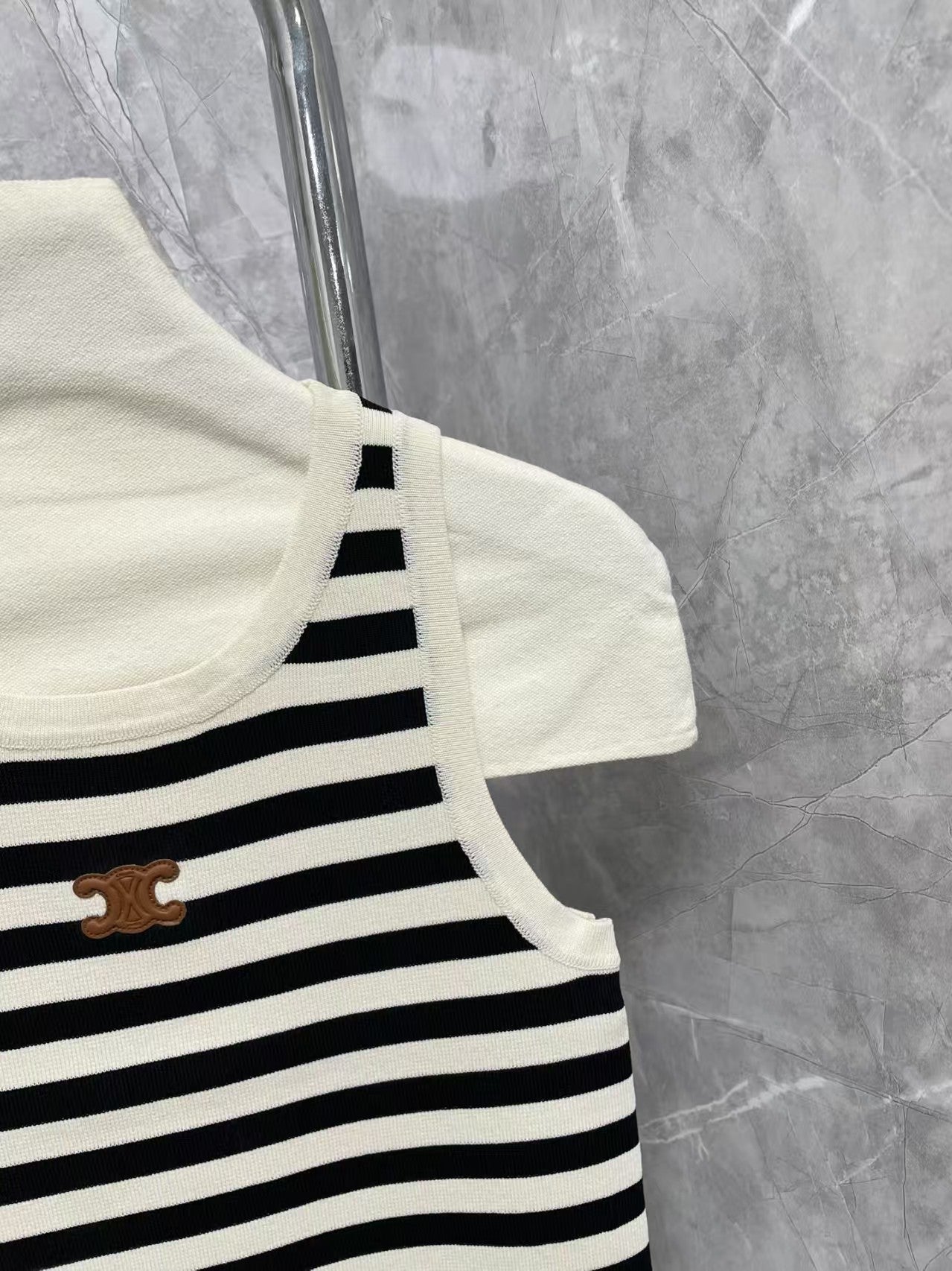New contrast striped vest