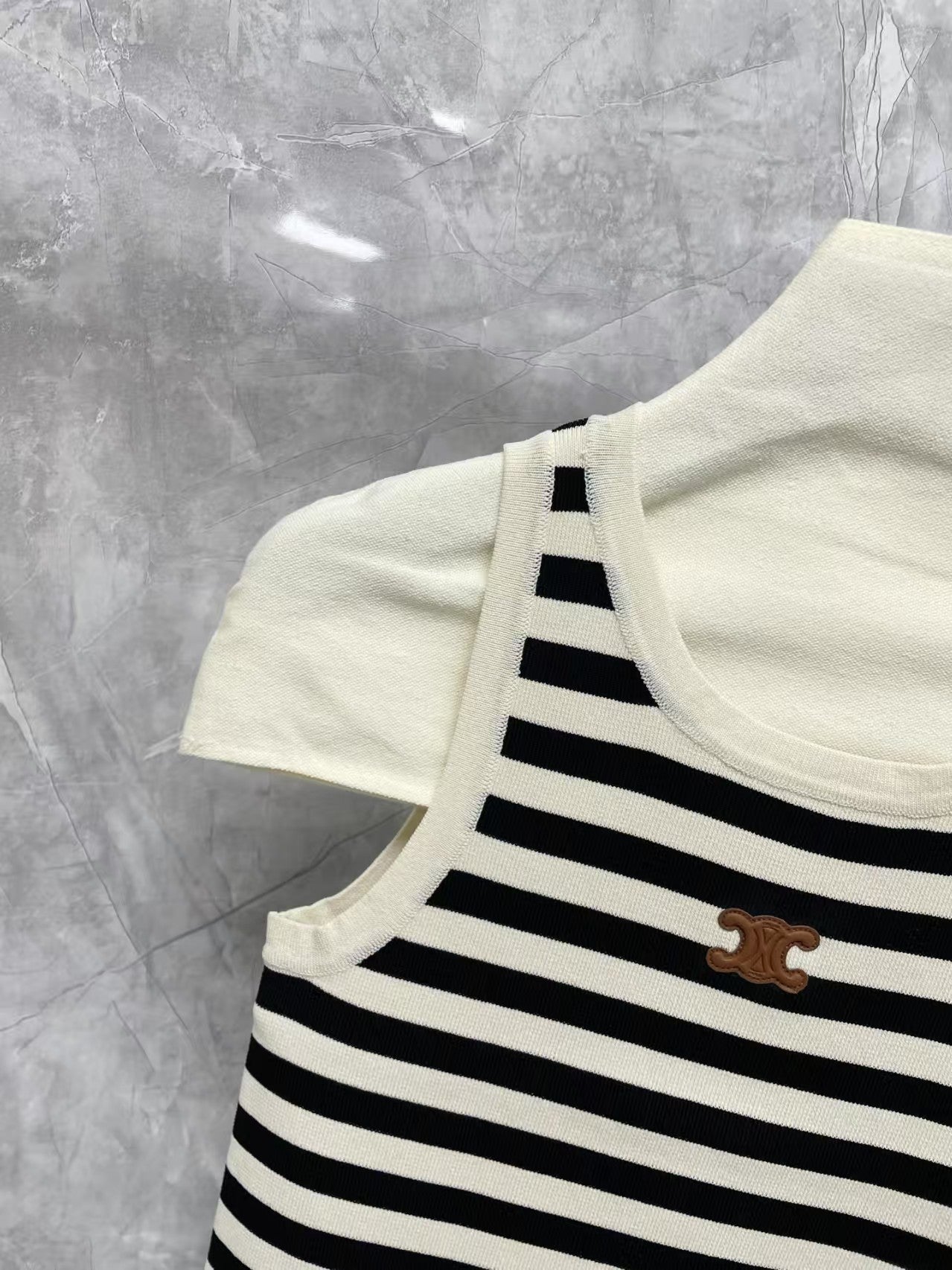 New contrast striped vest