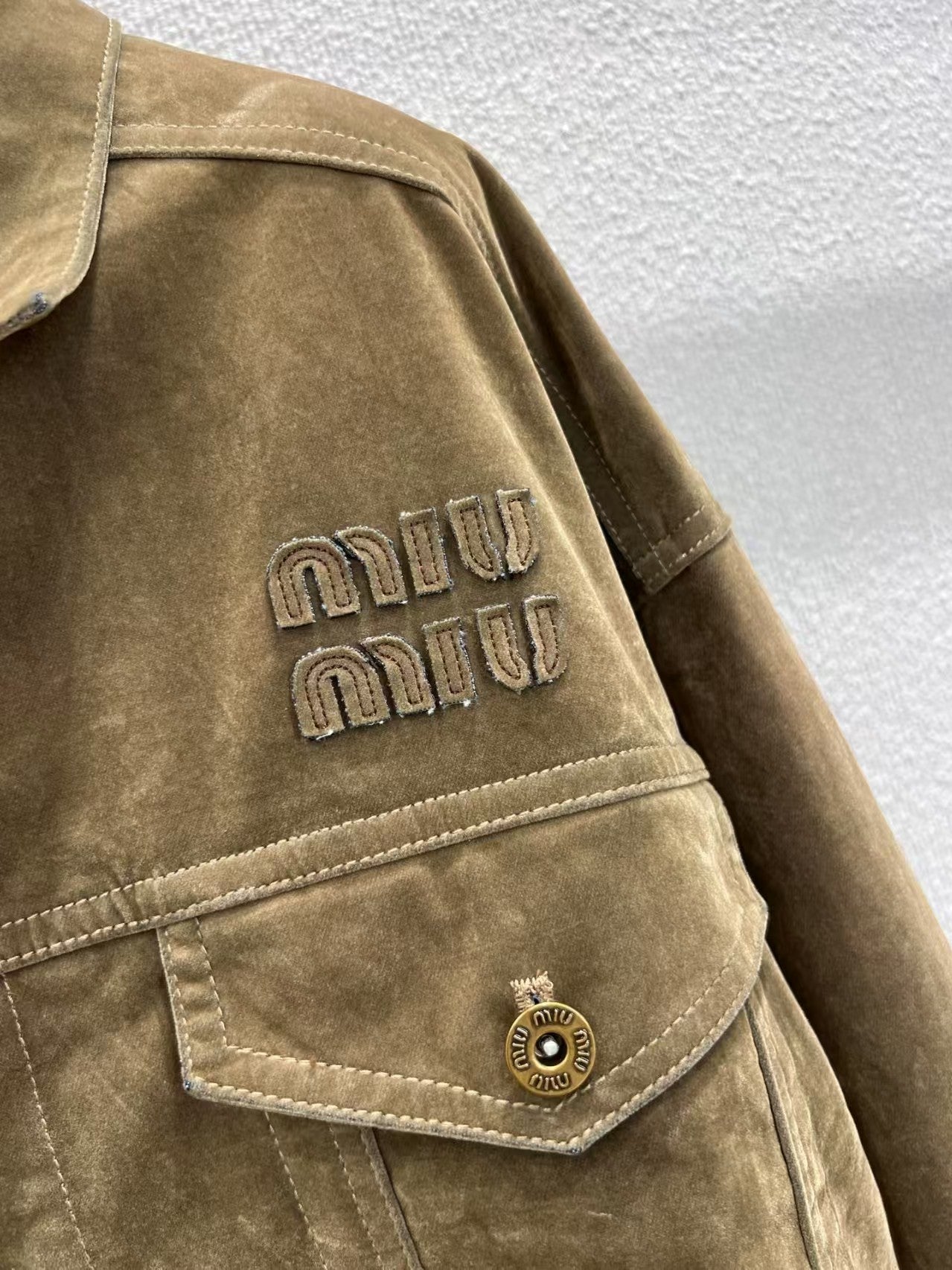 Single-breasted coat with velvet denim lapel