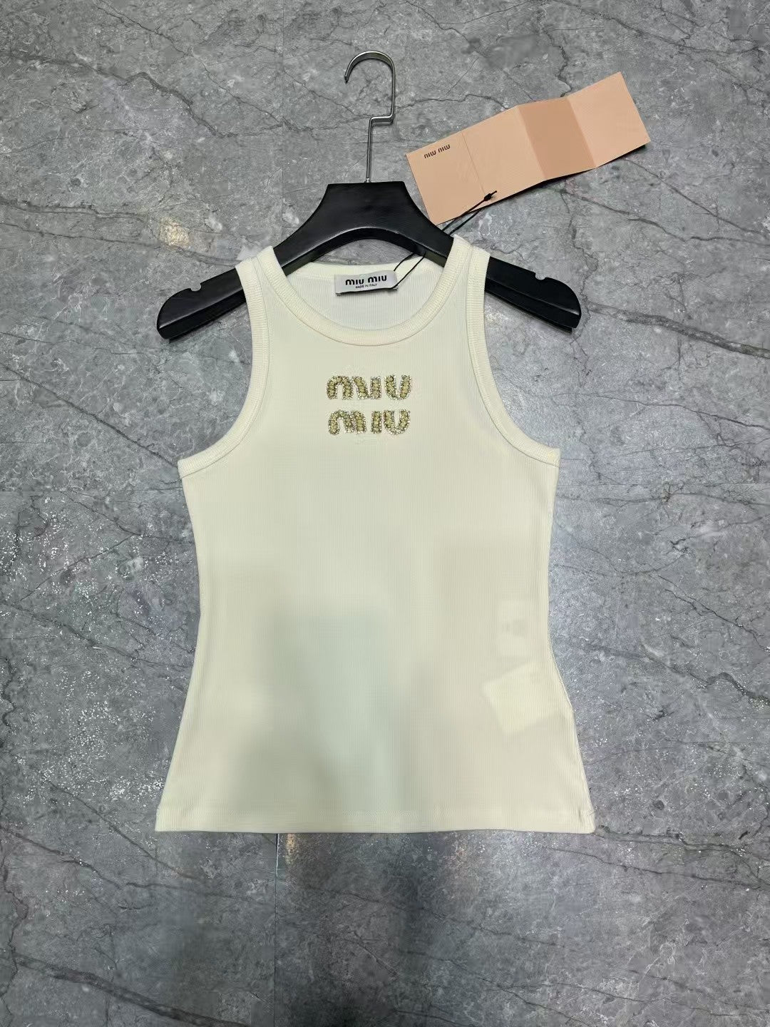 Yellow rhinestone lettering vest