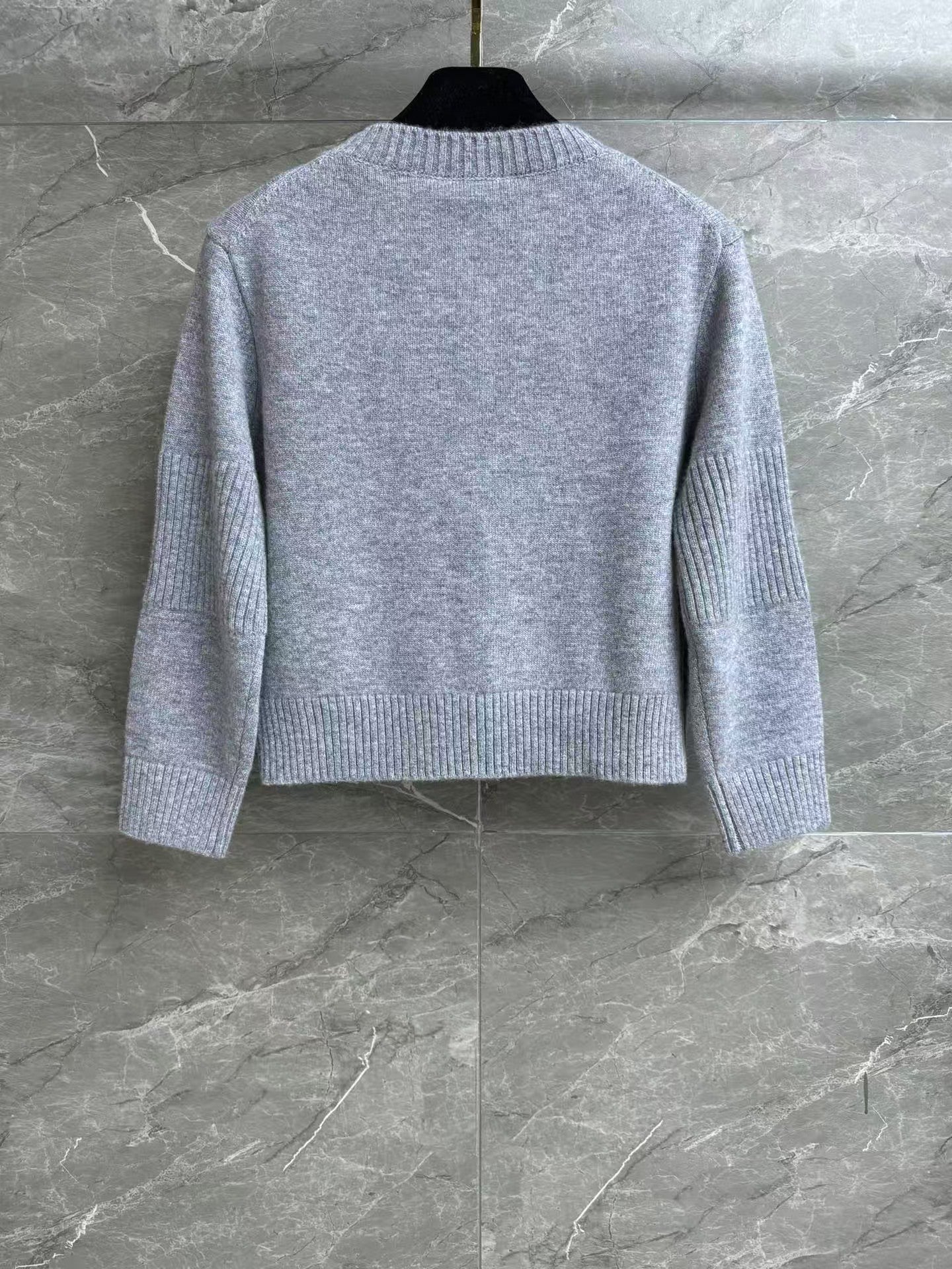 Cashmere cardigan with school bag button