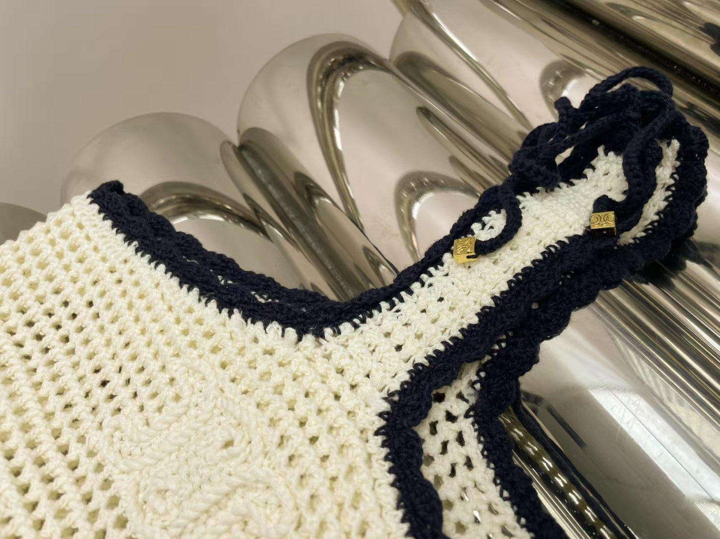 Arc de Triomphe hollow knitted suspender dress