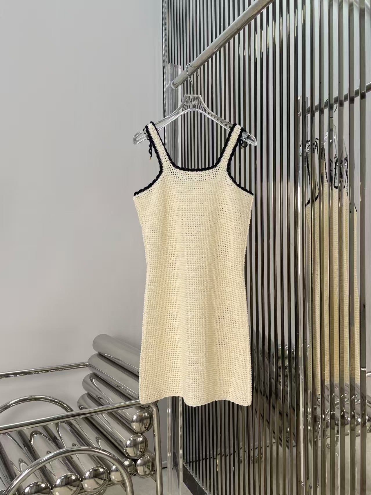 Arc de Triomphe hollow knitted suspender dress