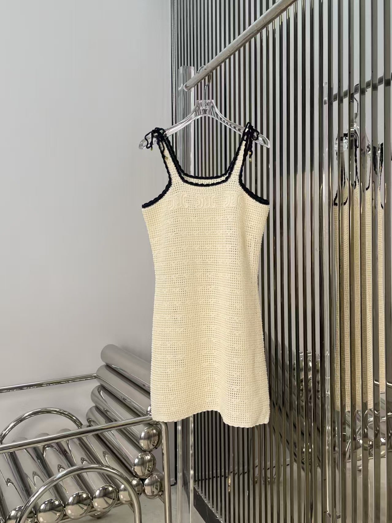 Arc de Triomphe hollow knitted suspender dress