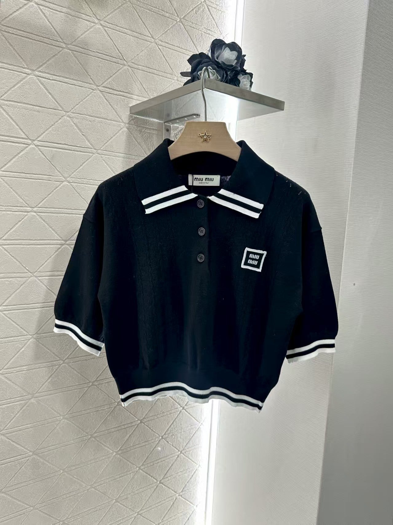 Cropped lapel knit top