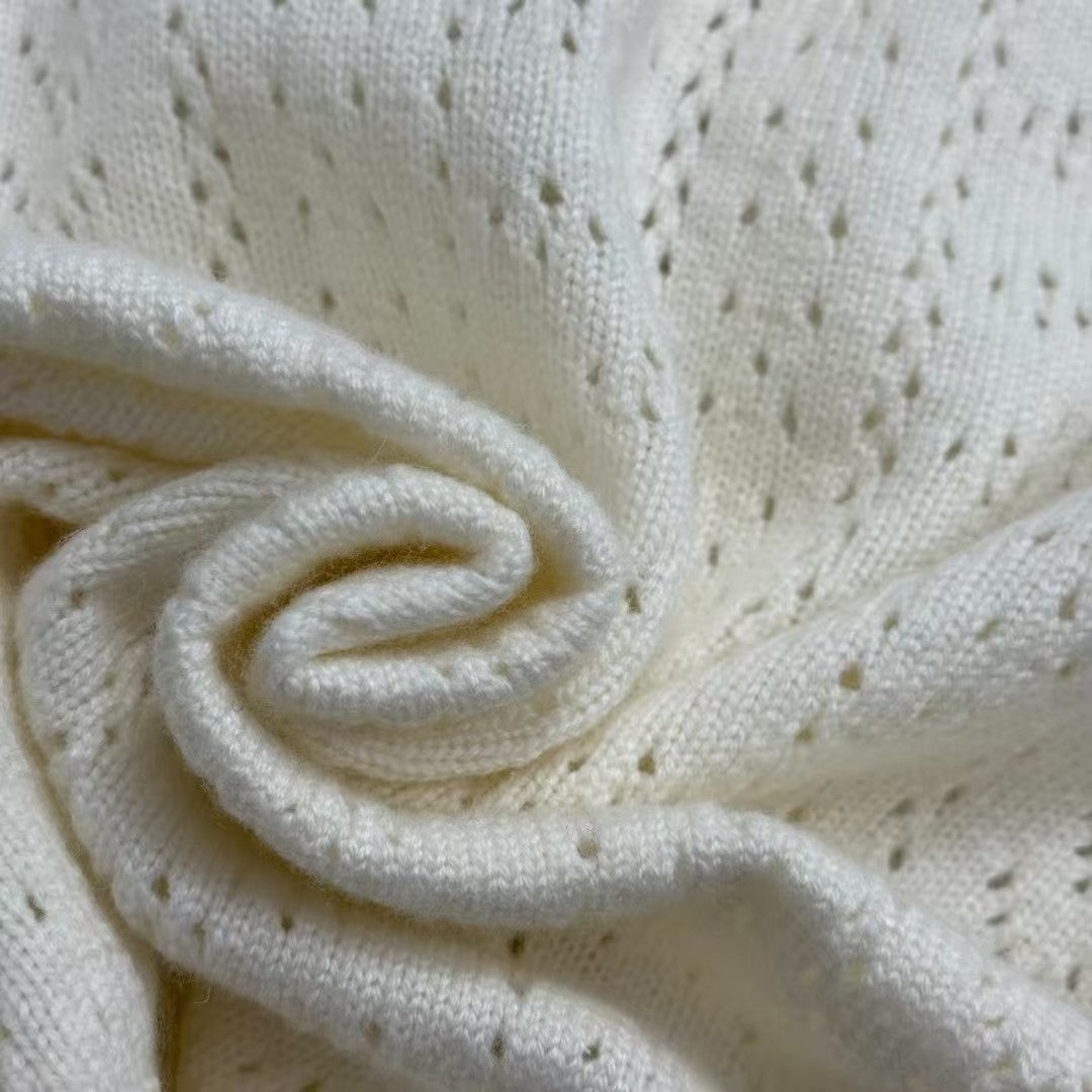 Hollow long-sleeved wool knit cardigan