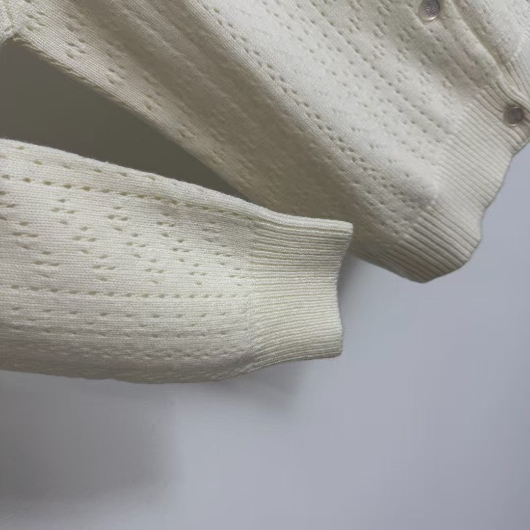 Hollow long-sleeved wool knit cardigan
