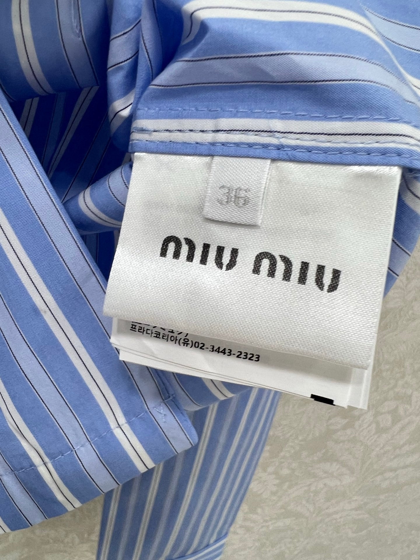 New lapel blue striped shirt