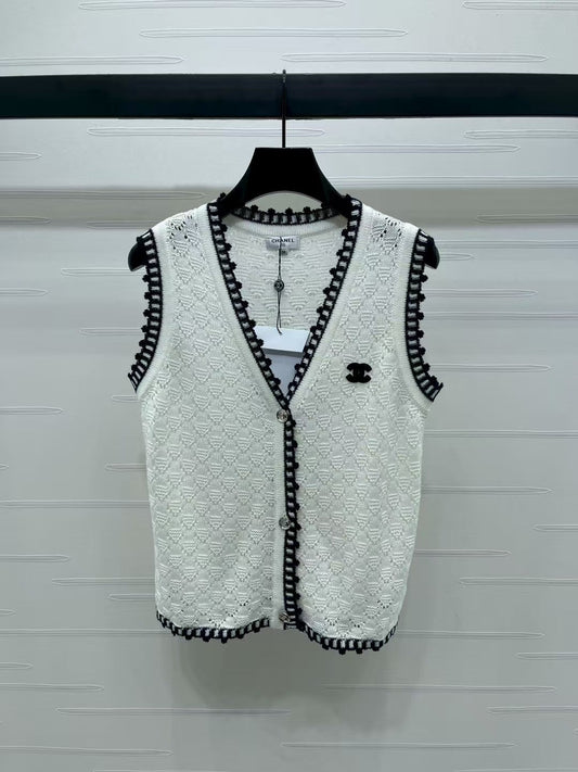 Lace-trimmed knitted vest