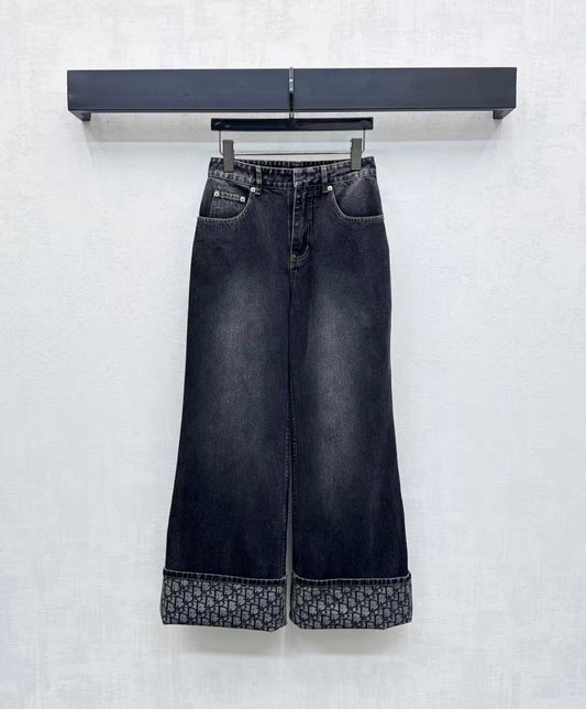 High-waisted bleached denim trousers