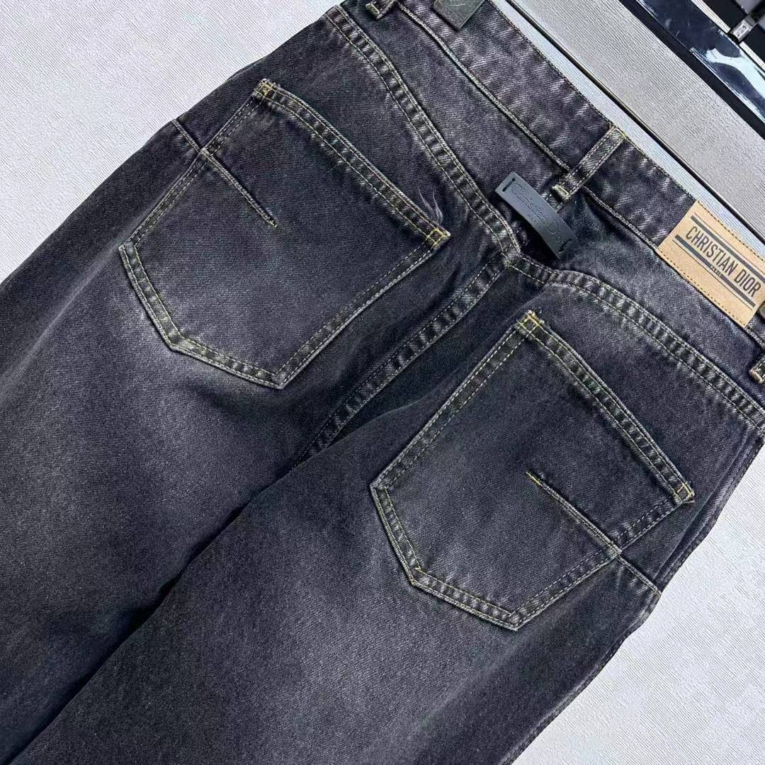 High-waisted bleached denim trousers