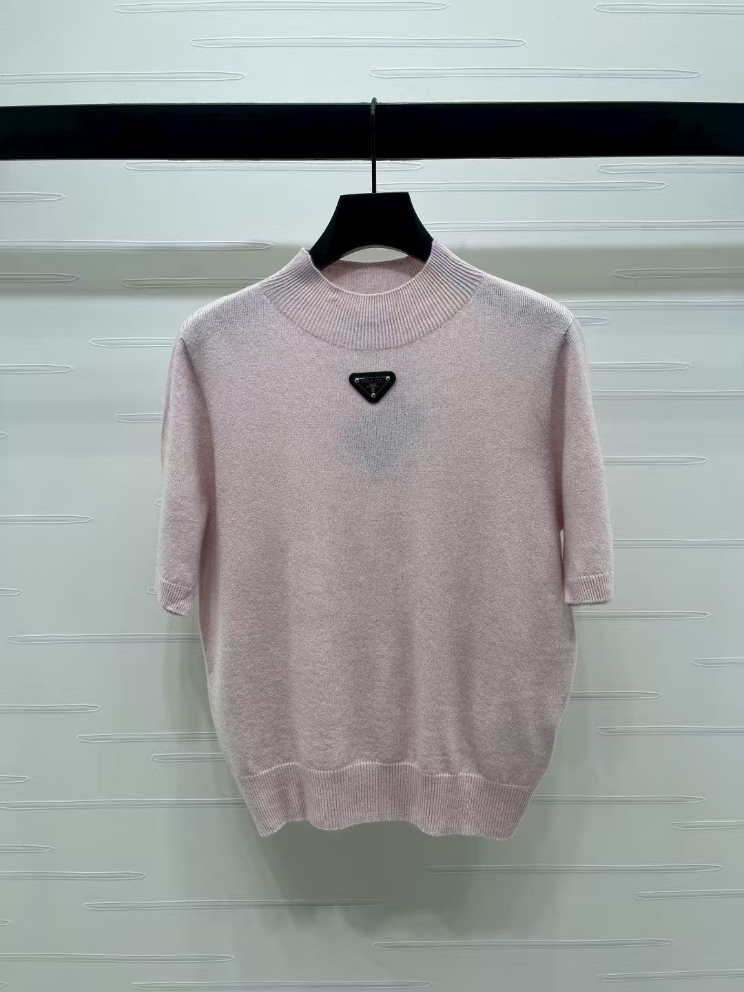 Triangle logo knitted short sleeves