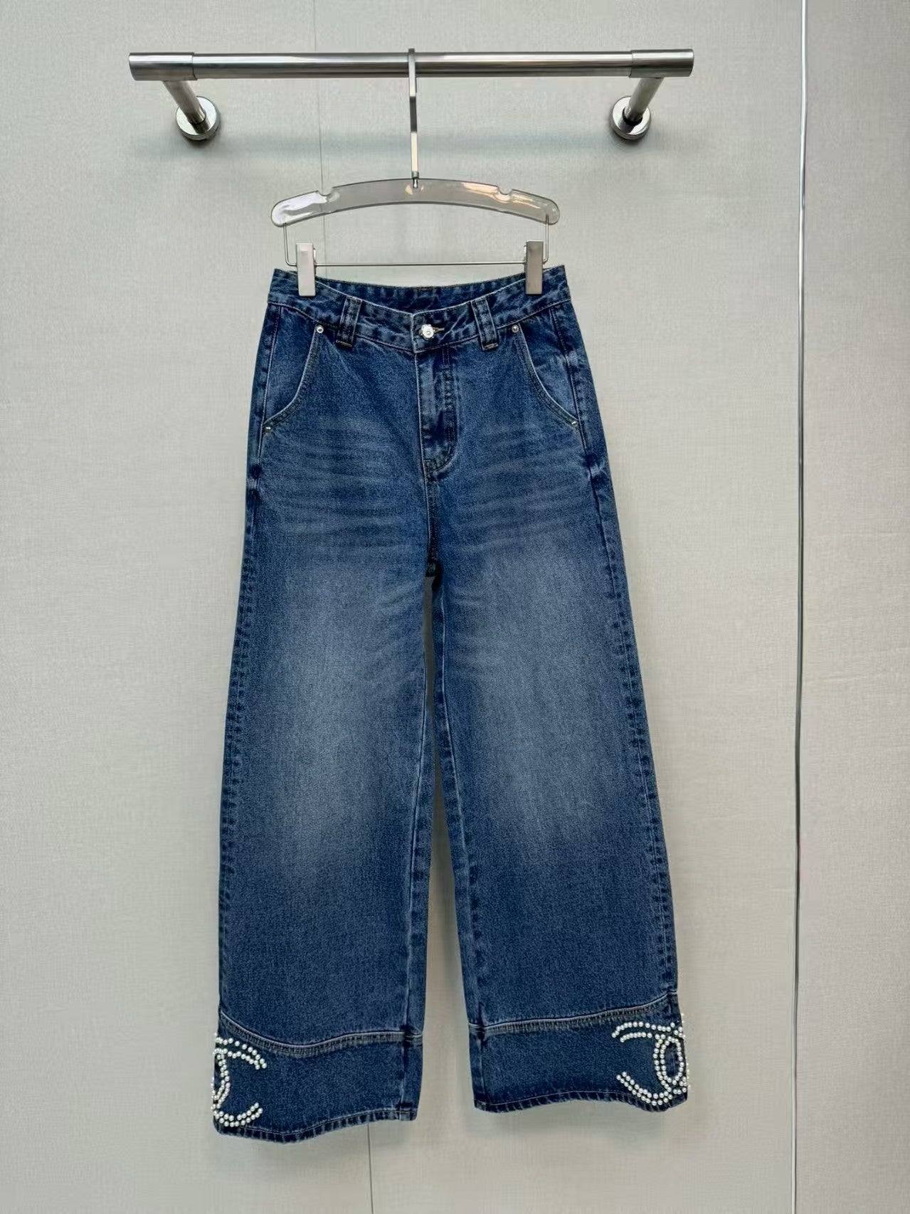 Jeans with handmade pearl embellishments