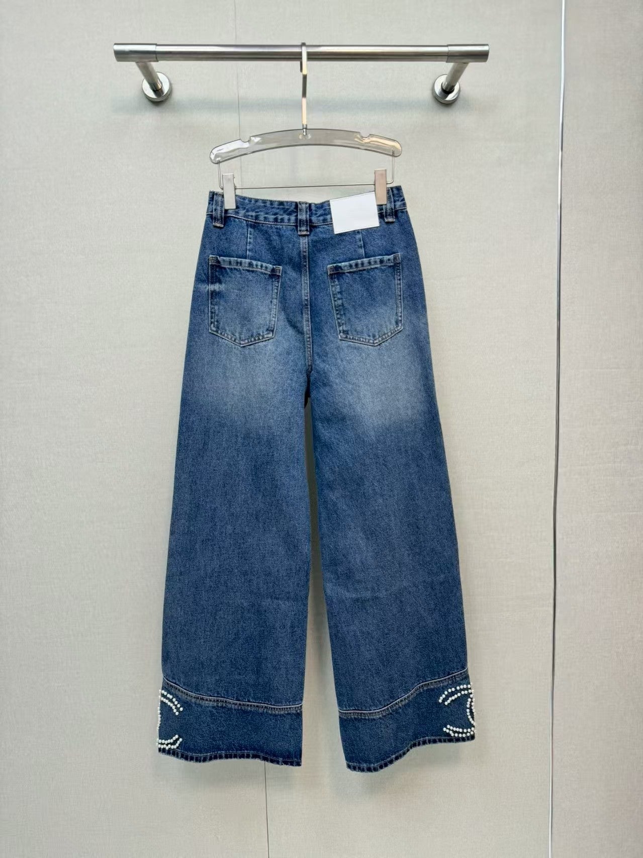 Jeans with handmade pearl embellishments