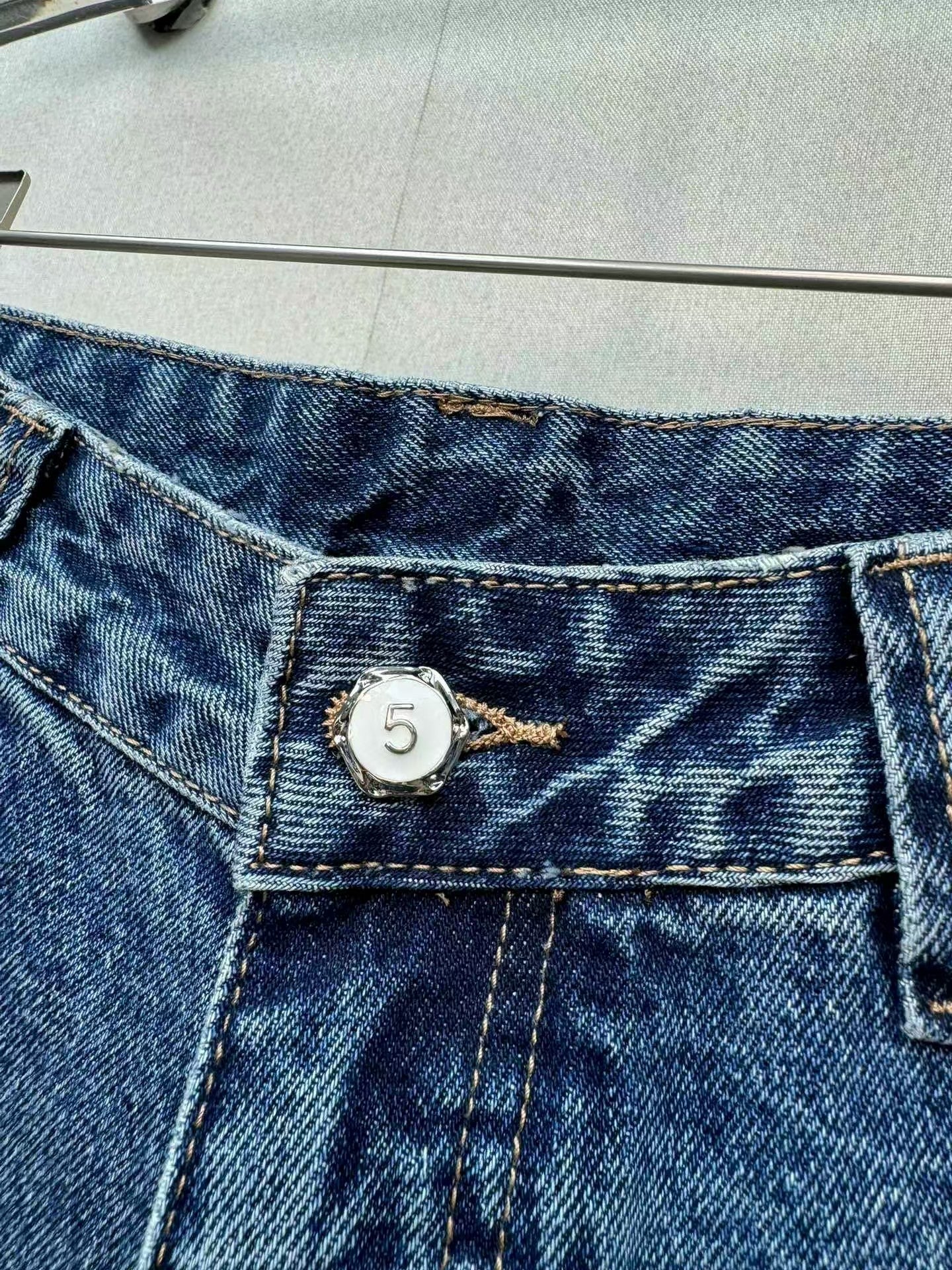 Jeans with handmade pearl embellishments