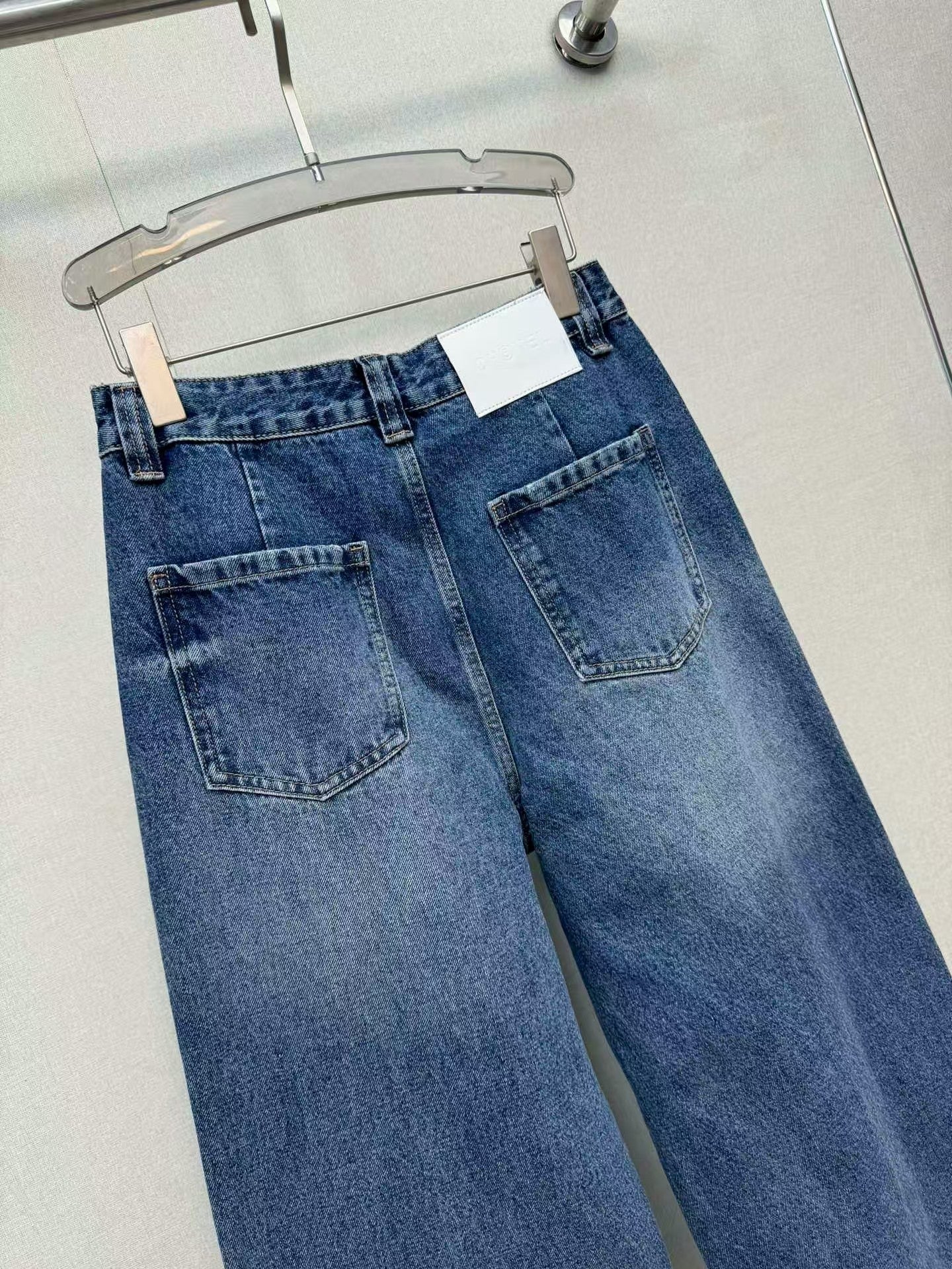 Jeans with handmade pearl embellishments