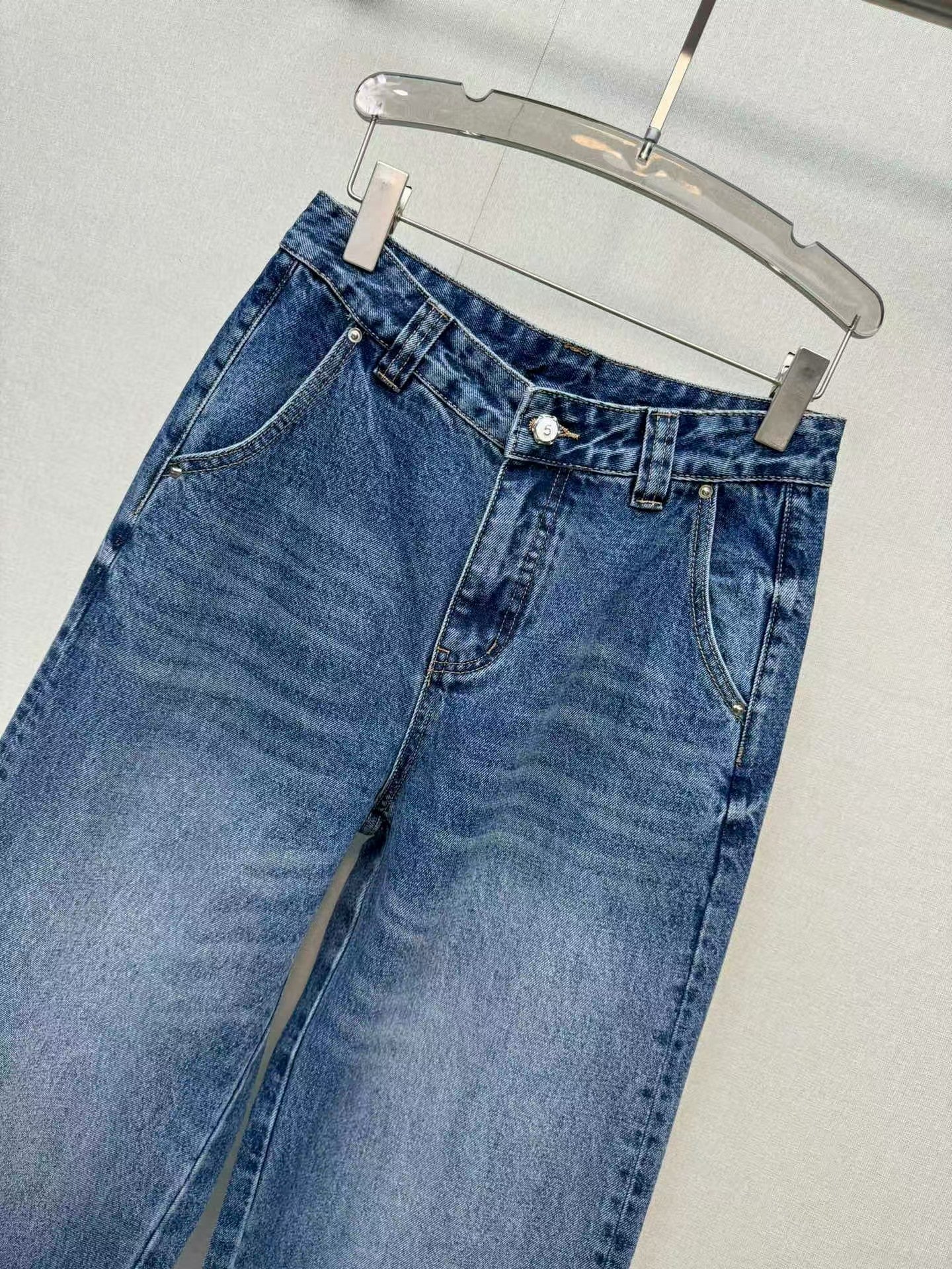 Jeans with handmade pearl embellishments