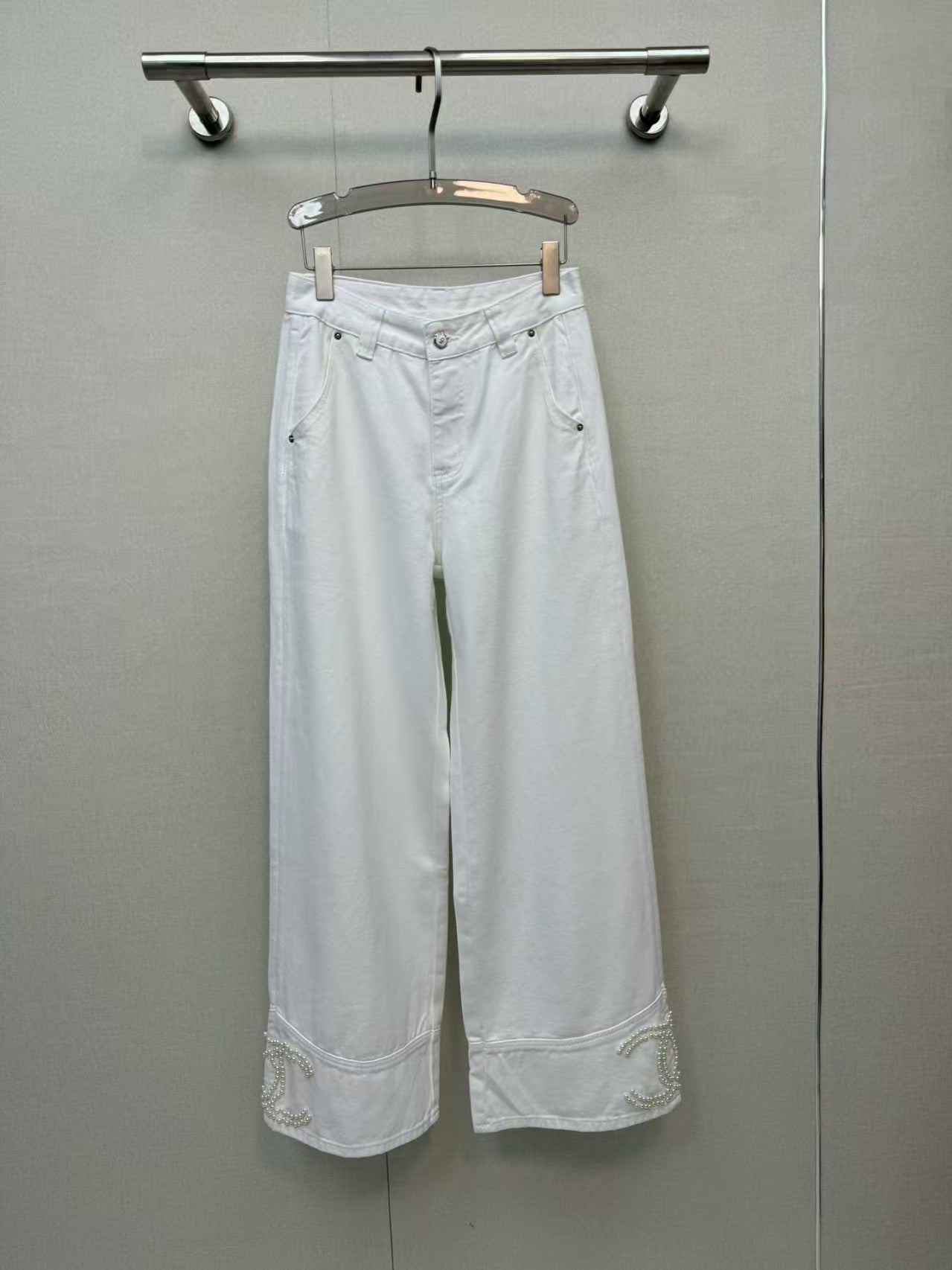 Jeans with handmade pearl embellishments