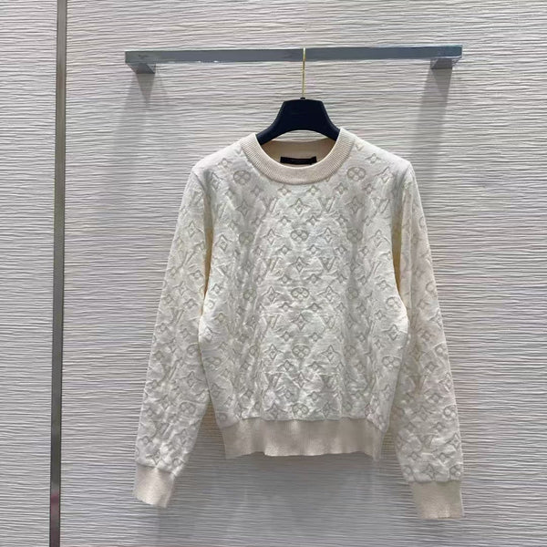 New monogram sweater