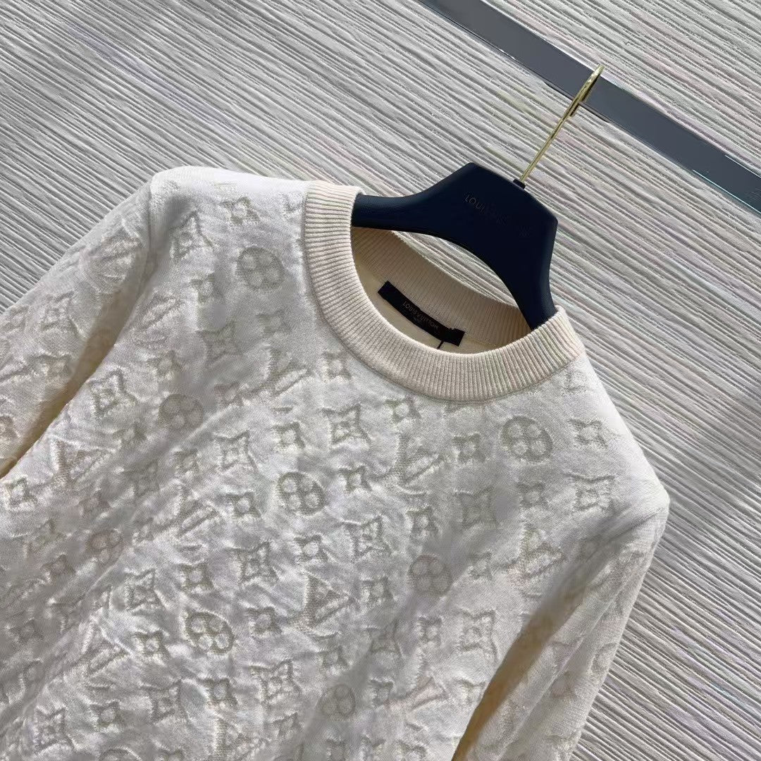 New monogram sweater