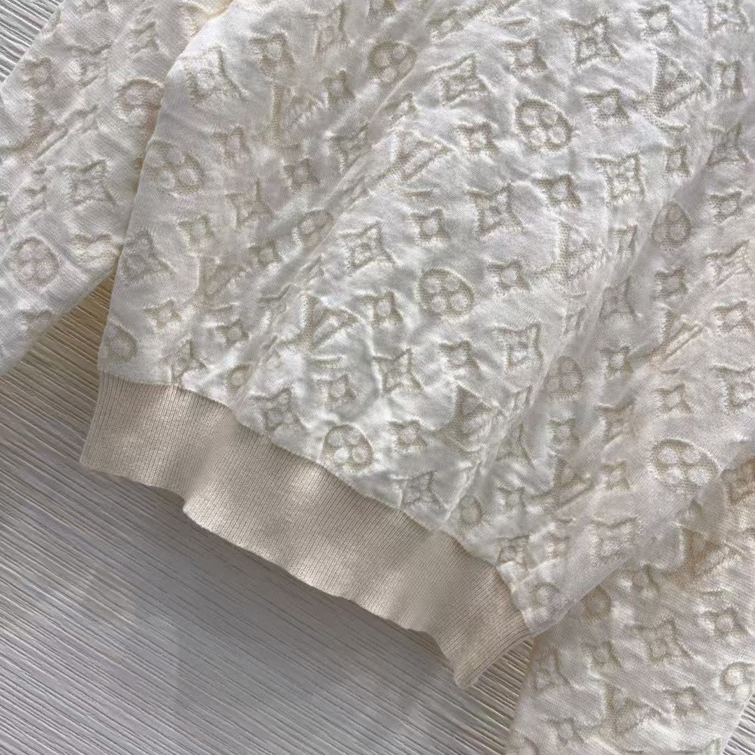New monogram sweater