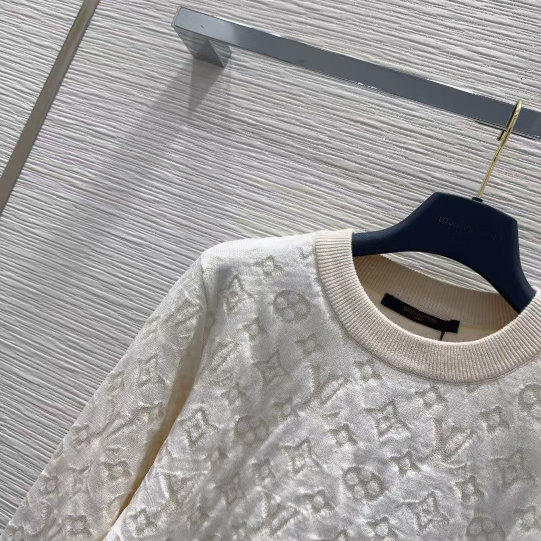 New monogram sweater