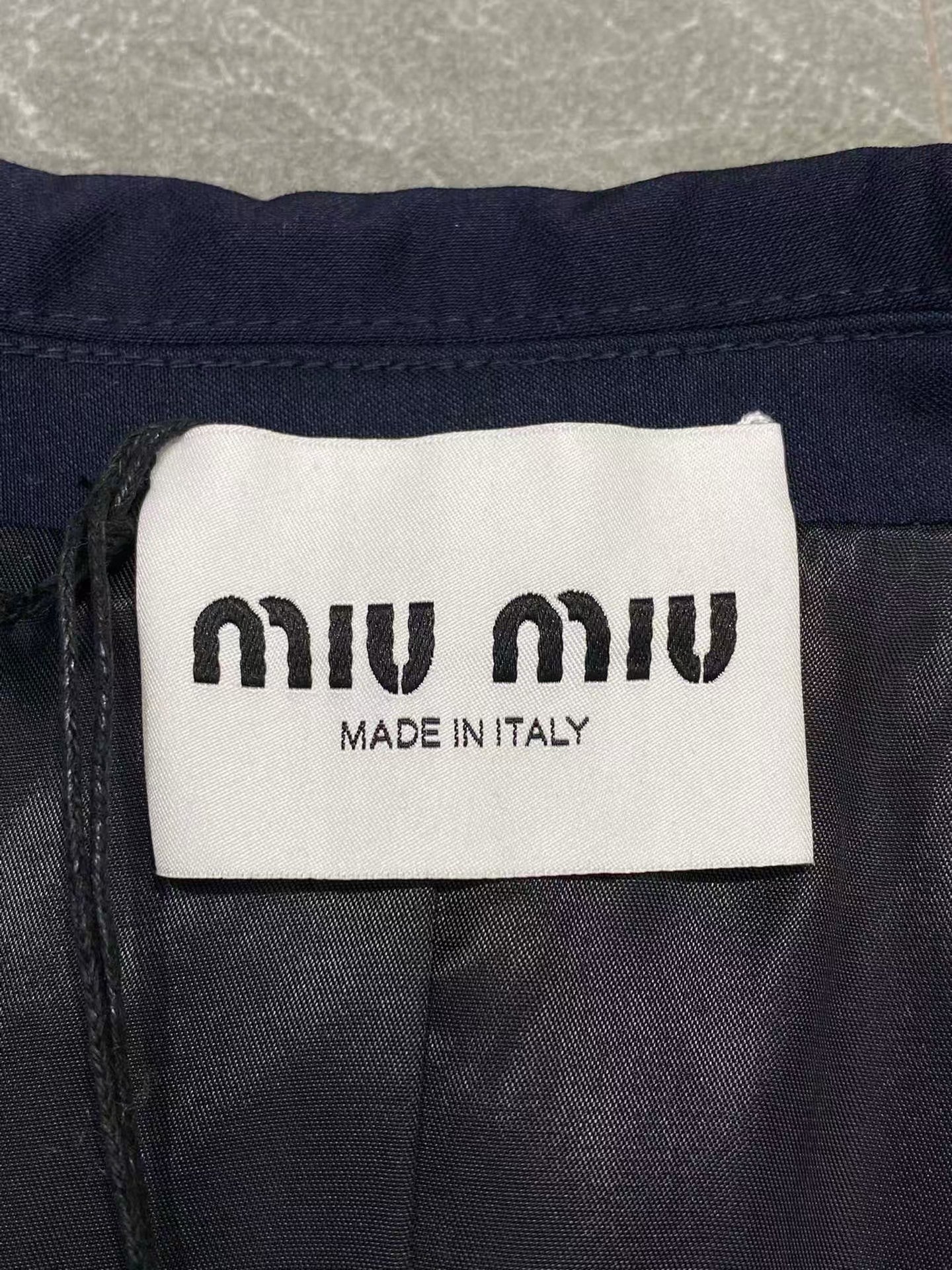 Embroidered lettering logo jacket