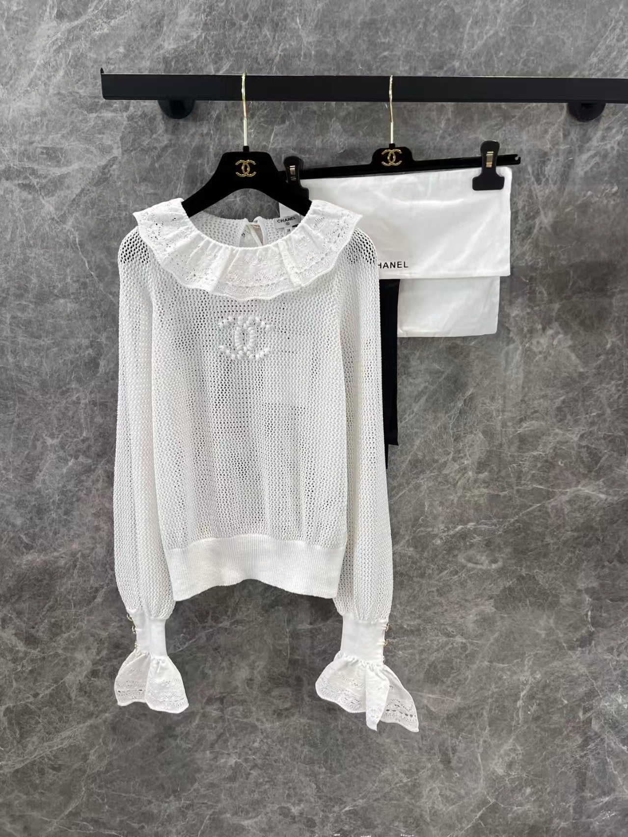 Ruffled collar hollow trumpet sleeve knitted top