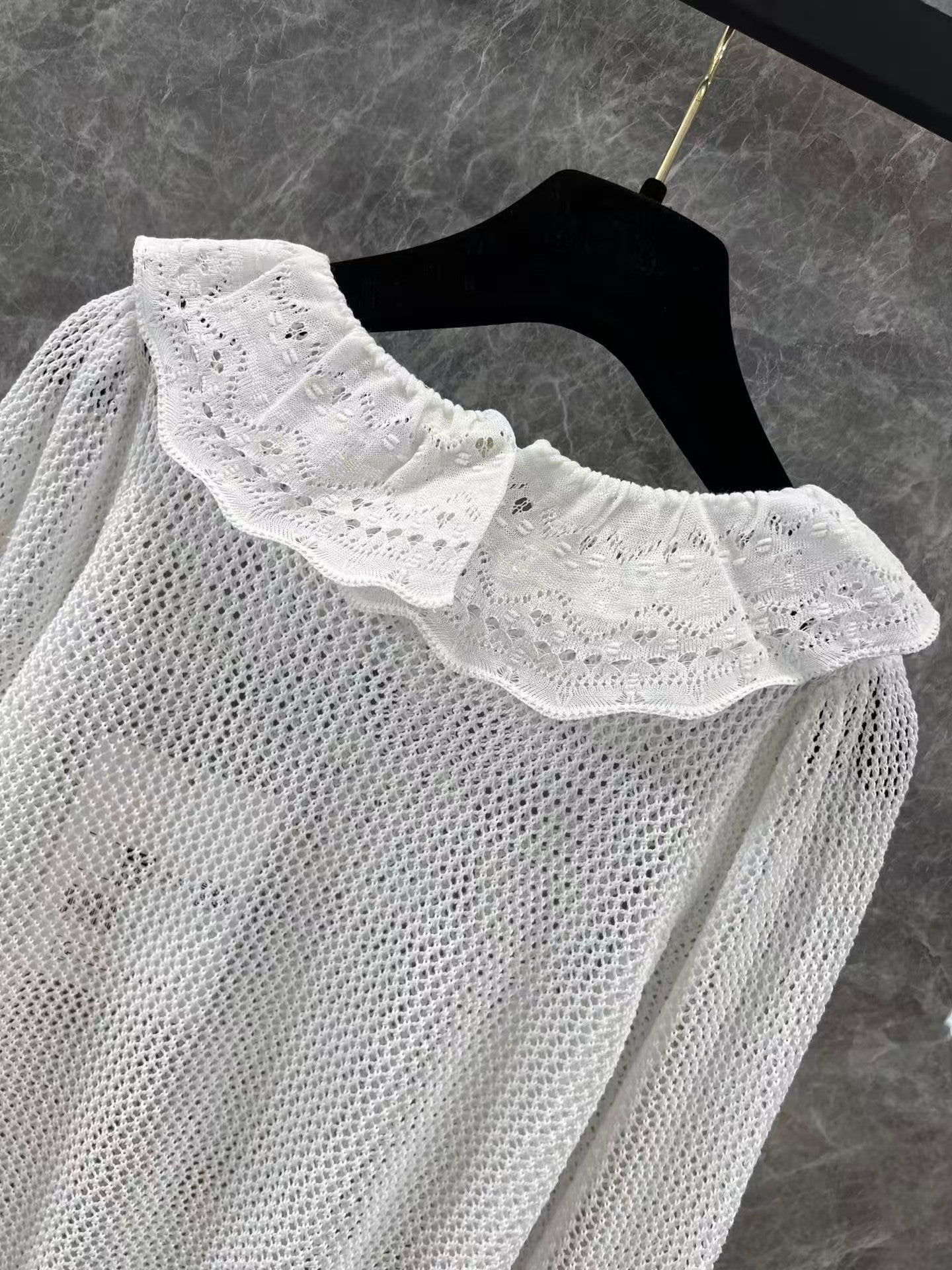 Ruffled collar hollow trumpet sleeve knitted top