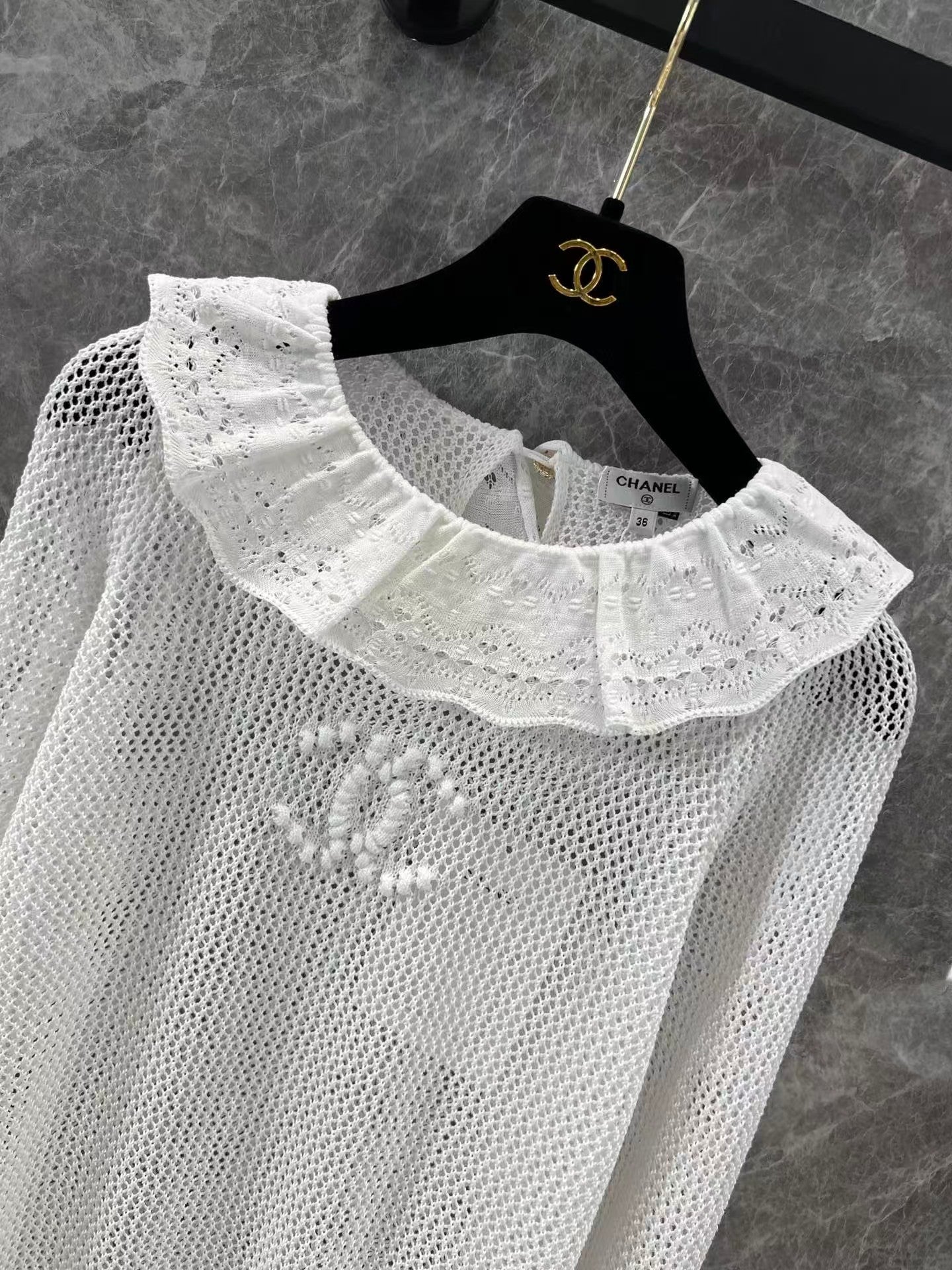 Ruffled collar hollow trumpet sleeve knitted top