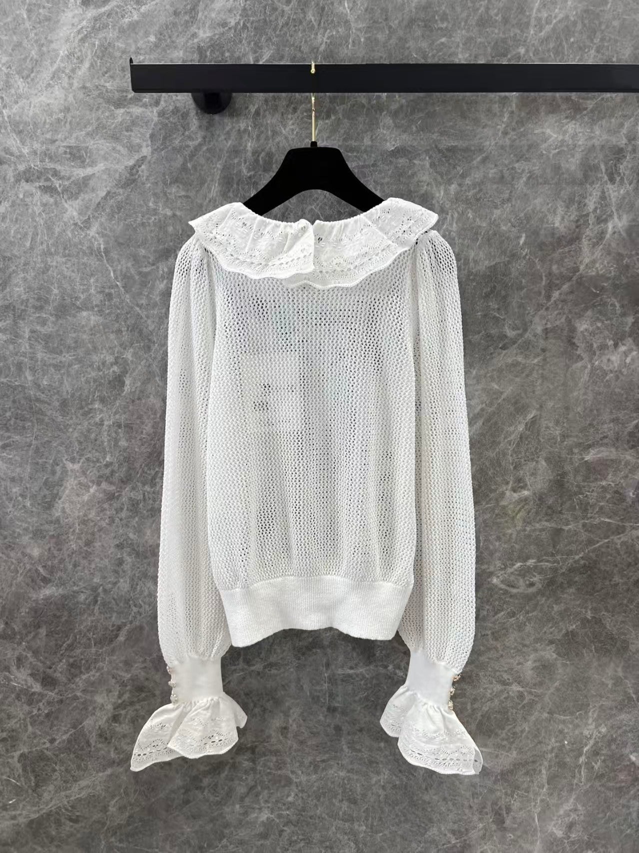 Ruffled collar hollow trumpet sleeve knitted top