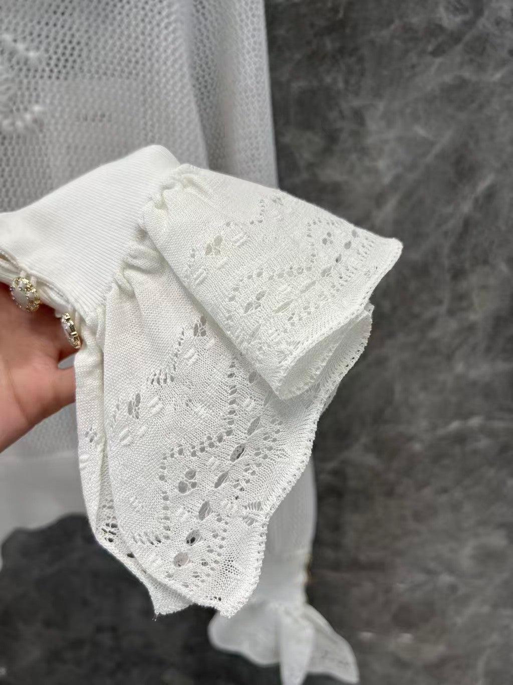 Ruffled collar hollow trumpet sleeve knitted top