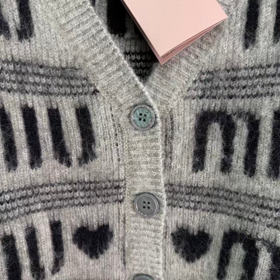 Color-blocked striped heart letter cardigan sweater