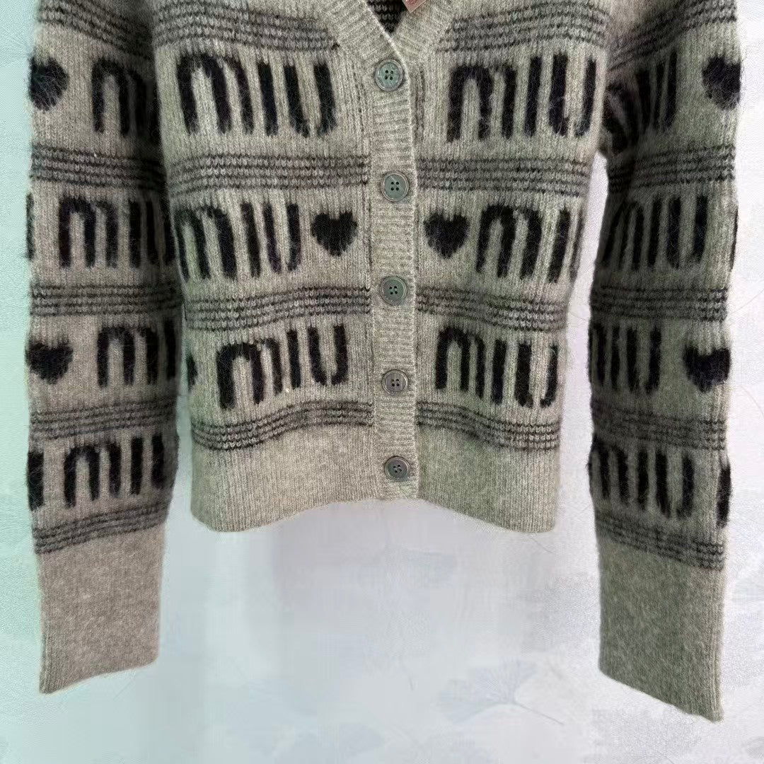 Color-blocked striped heart letter cardigan sweater