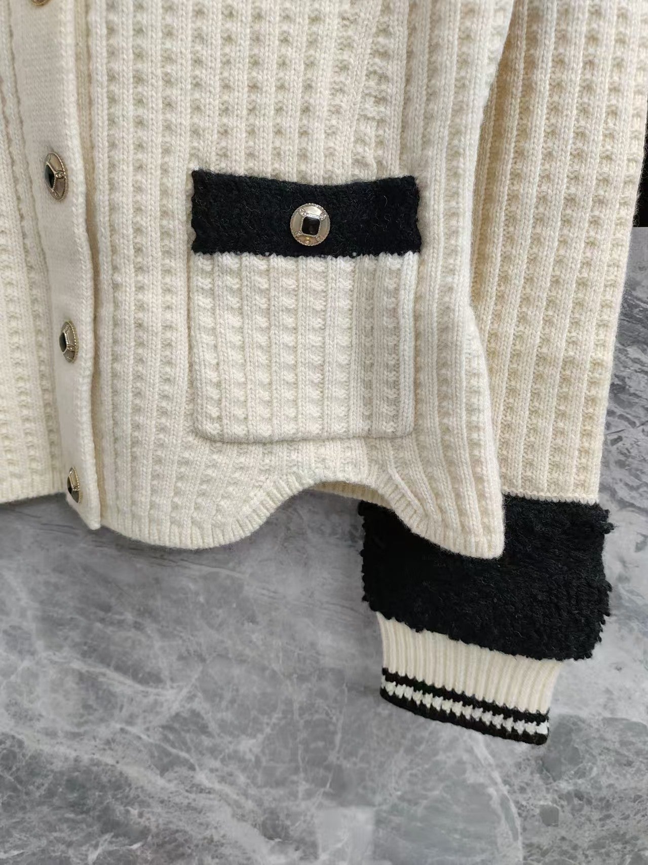 Black and white color-blocked wool knit cardigan
