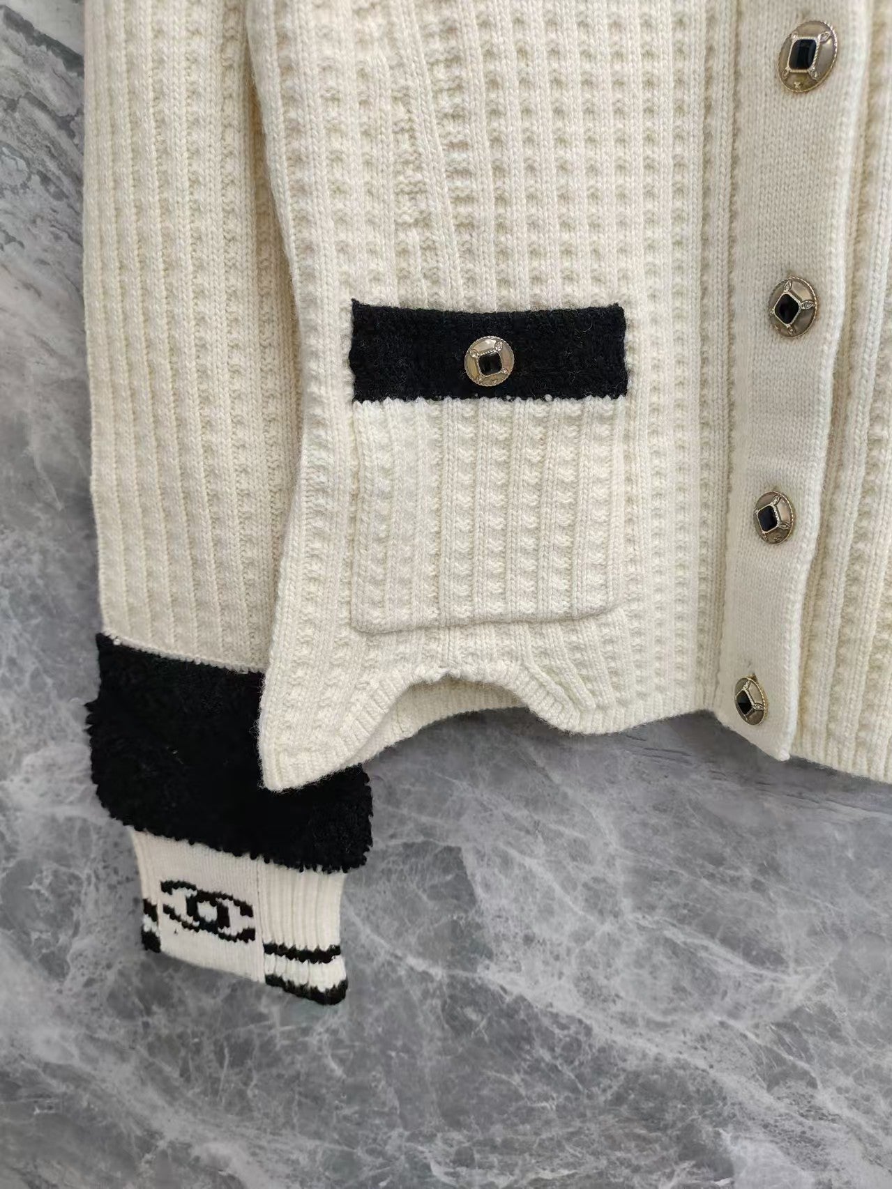 Black and white color-blocked wool knit cardigan