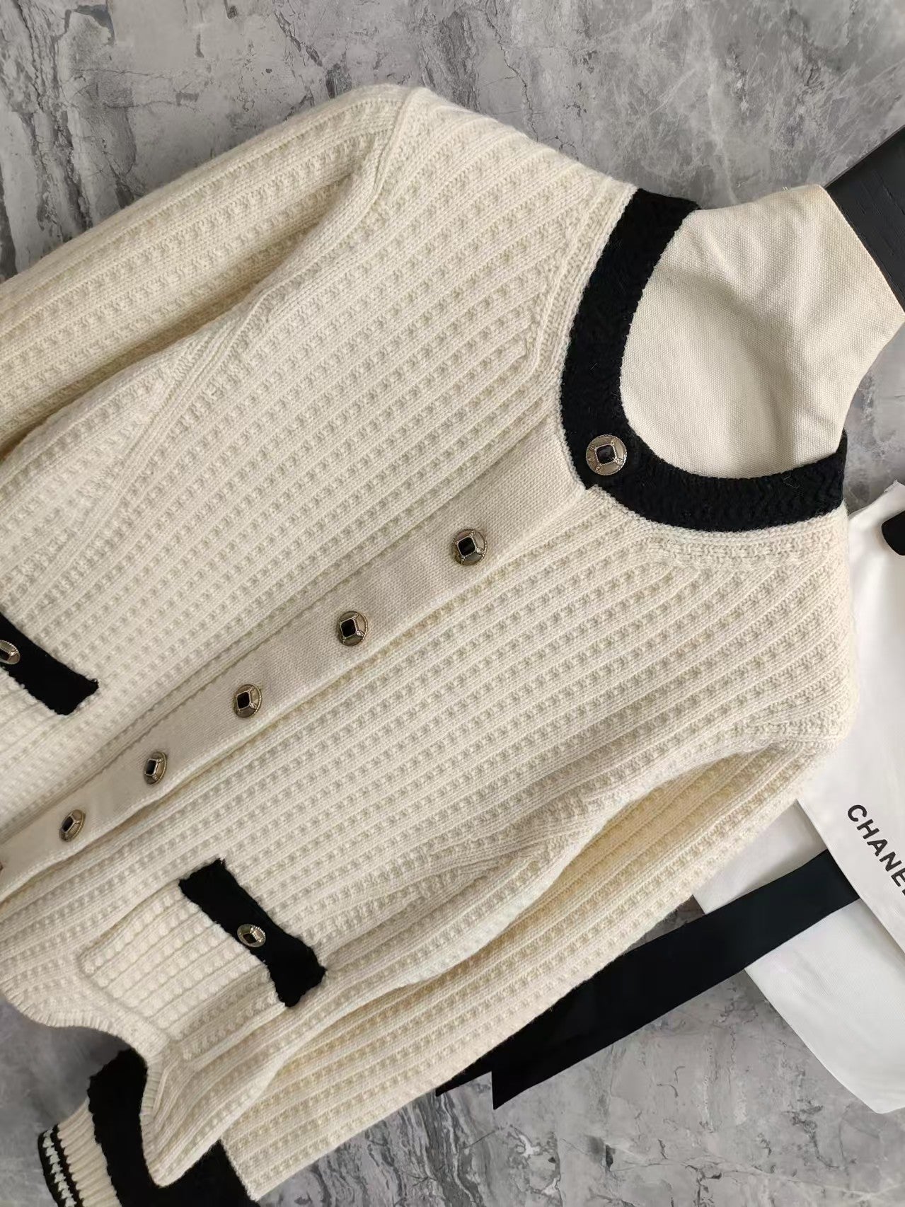 Black and white color-blocked wool knit cardigan